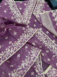 Onion cotton jamdani saree with yellowish threads work all over work.