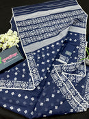 Deep blue jandani saree with white threads all over work.