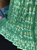 Jade green halfsilk jamdani saree with green off white golden self threads work