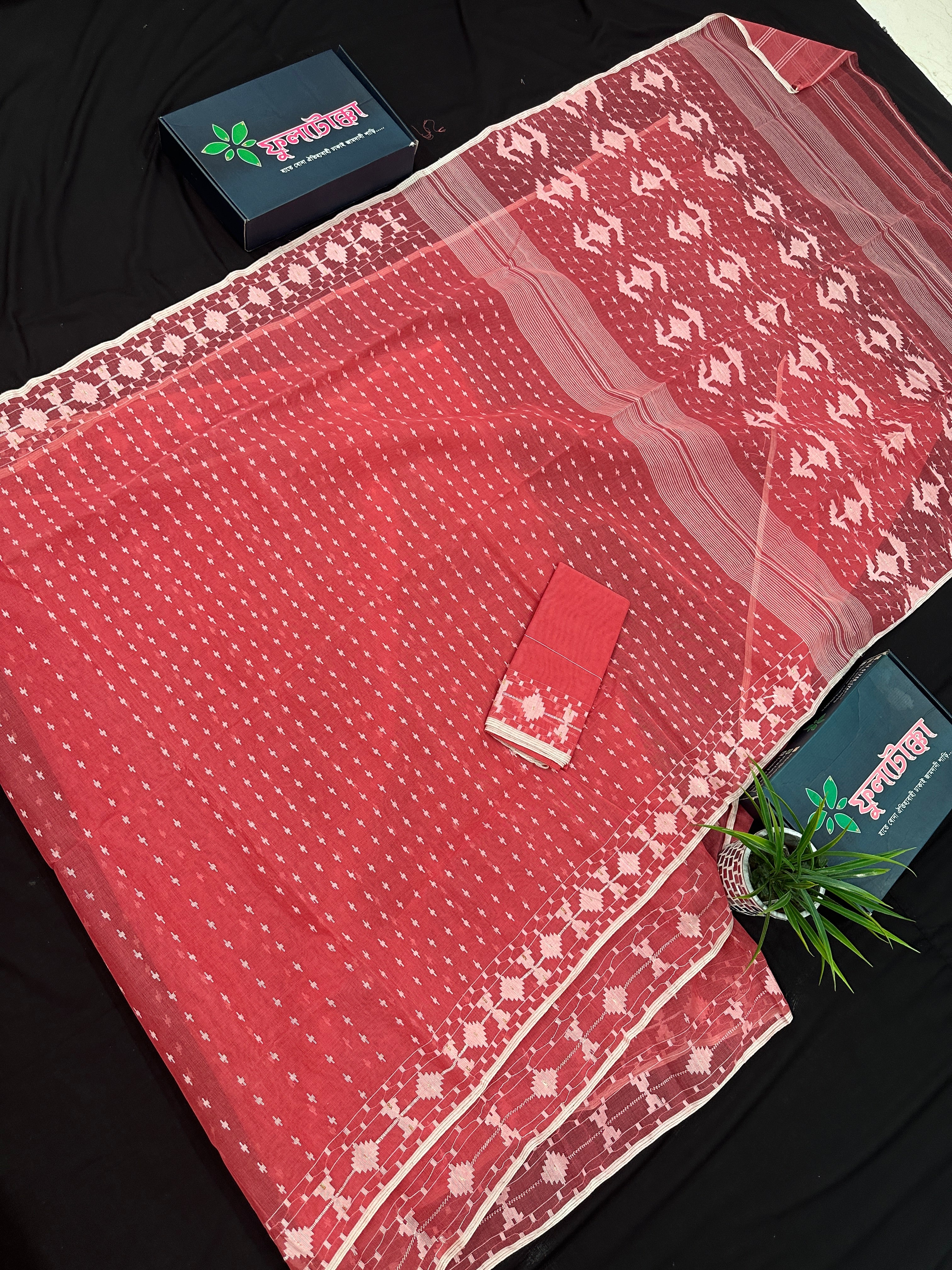 Sweet pink cotton jamdani saree with white threads work and blouse piece.