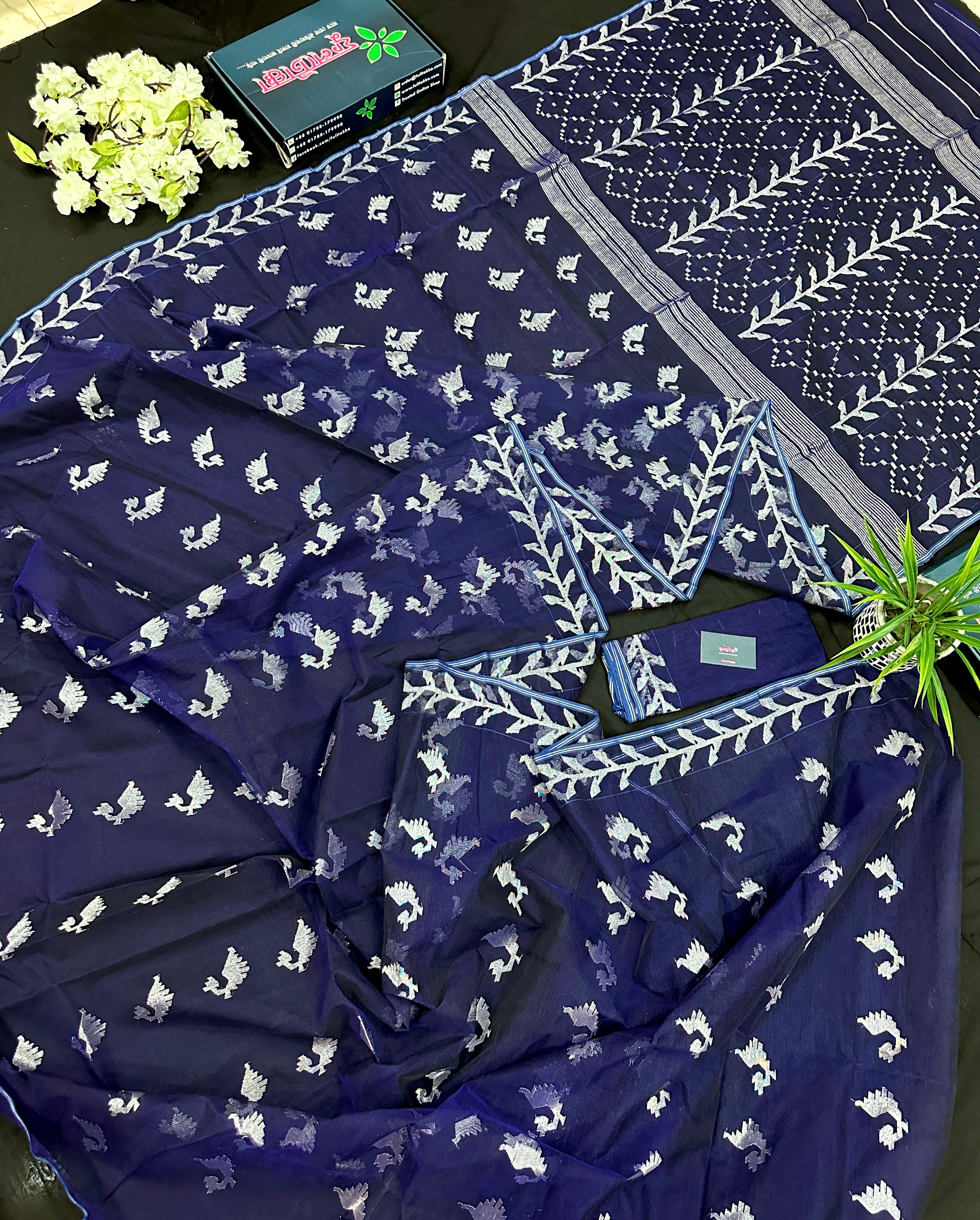 Navy blue jamdani saree with silver jori work soft threads all over work.