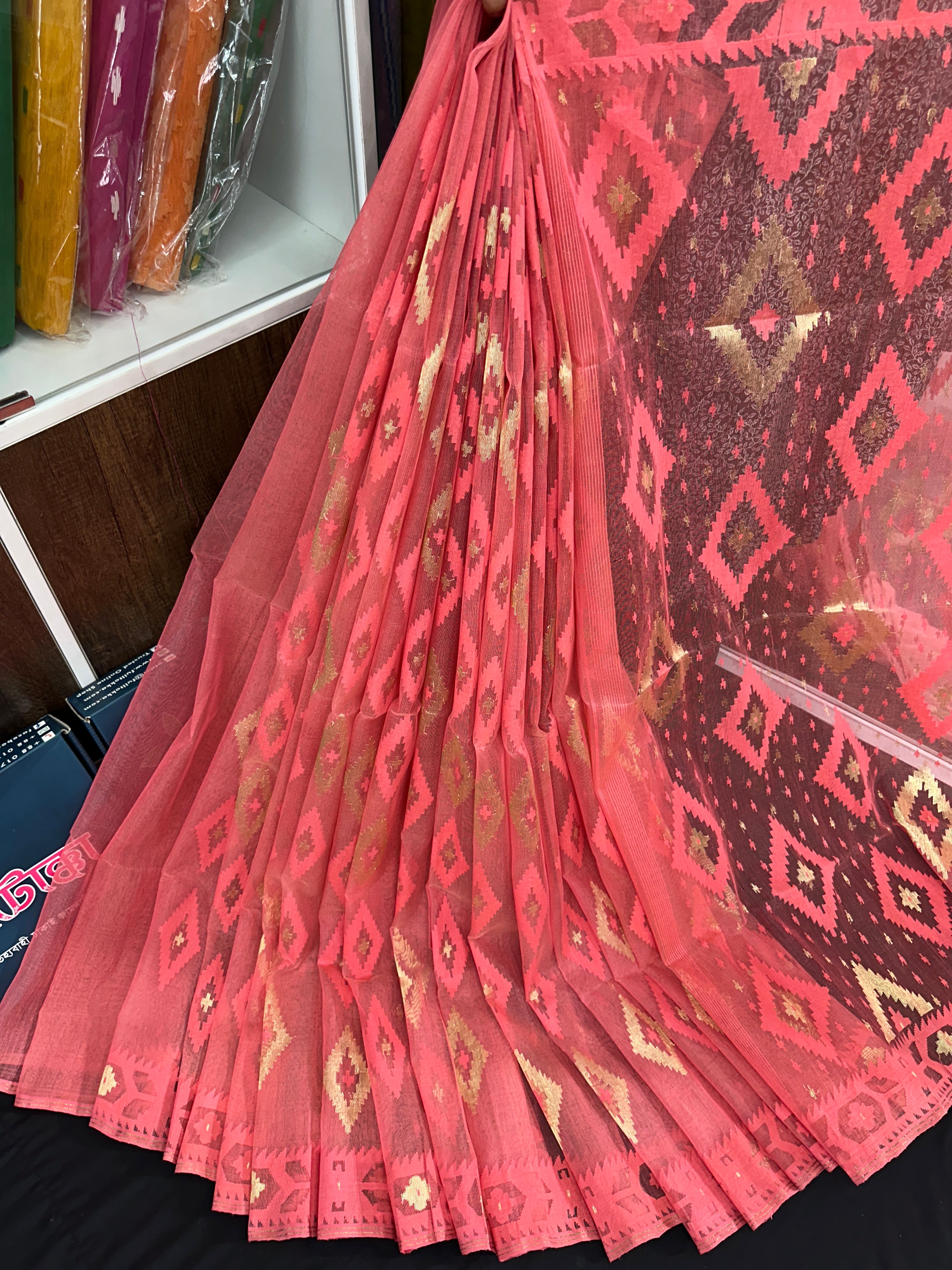 Georgia peach halfsilk jamdani saree with self threads work and golden jori work