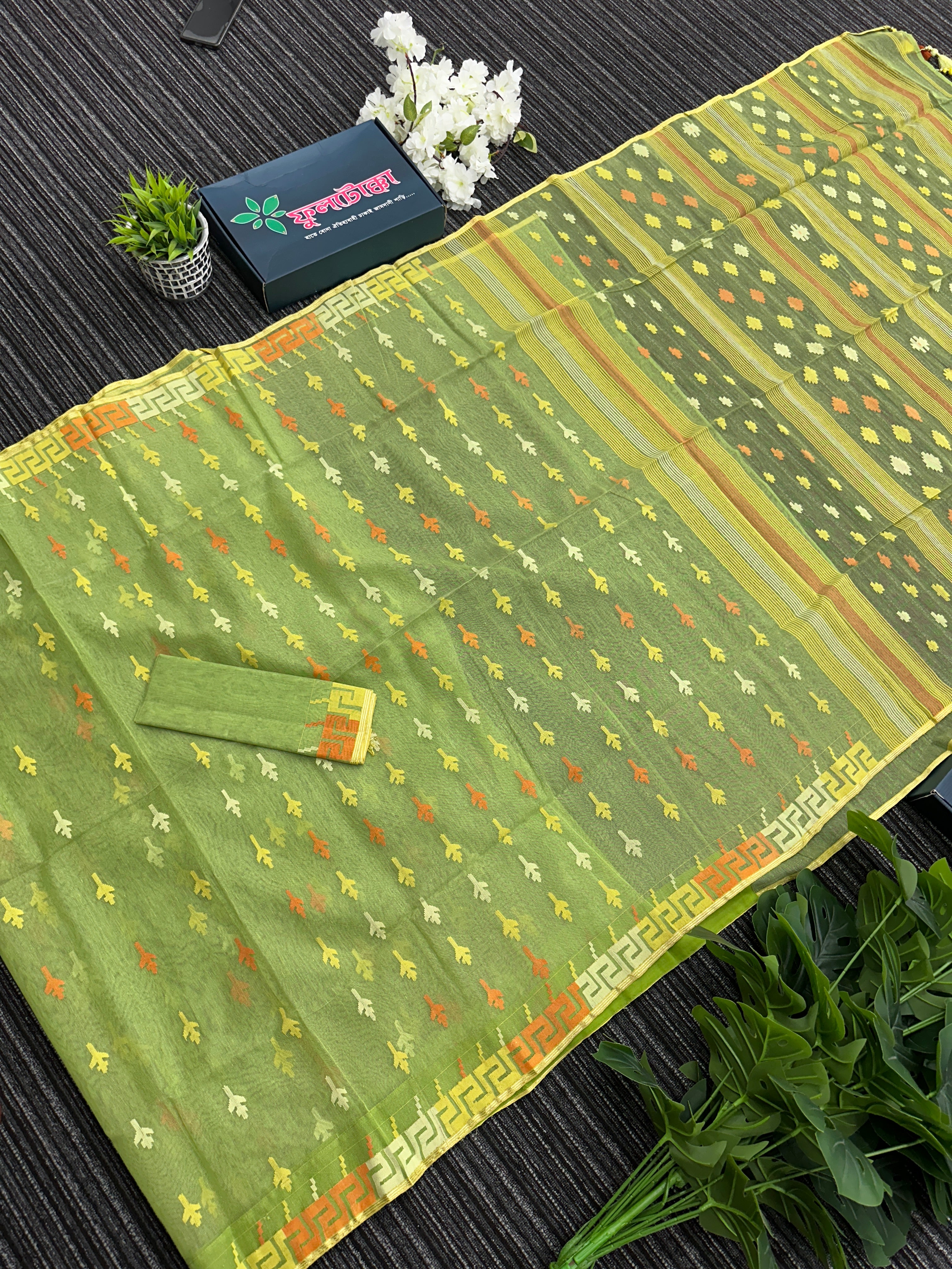 Olive green halfsilk jamdani saree with orange and olive threads work