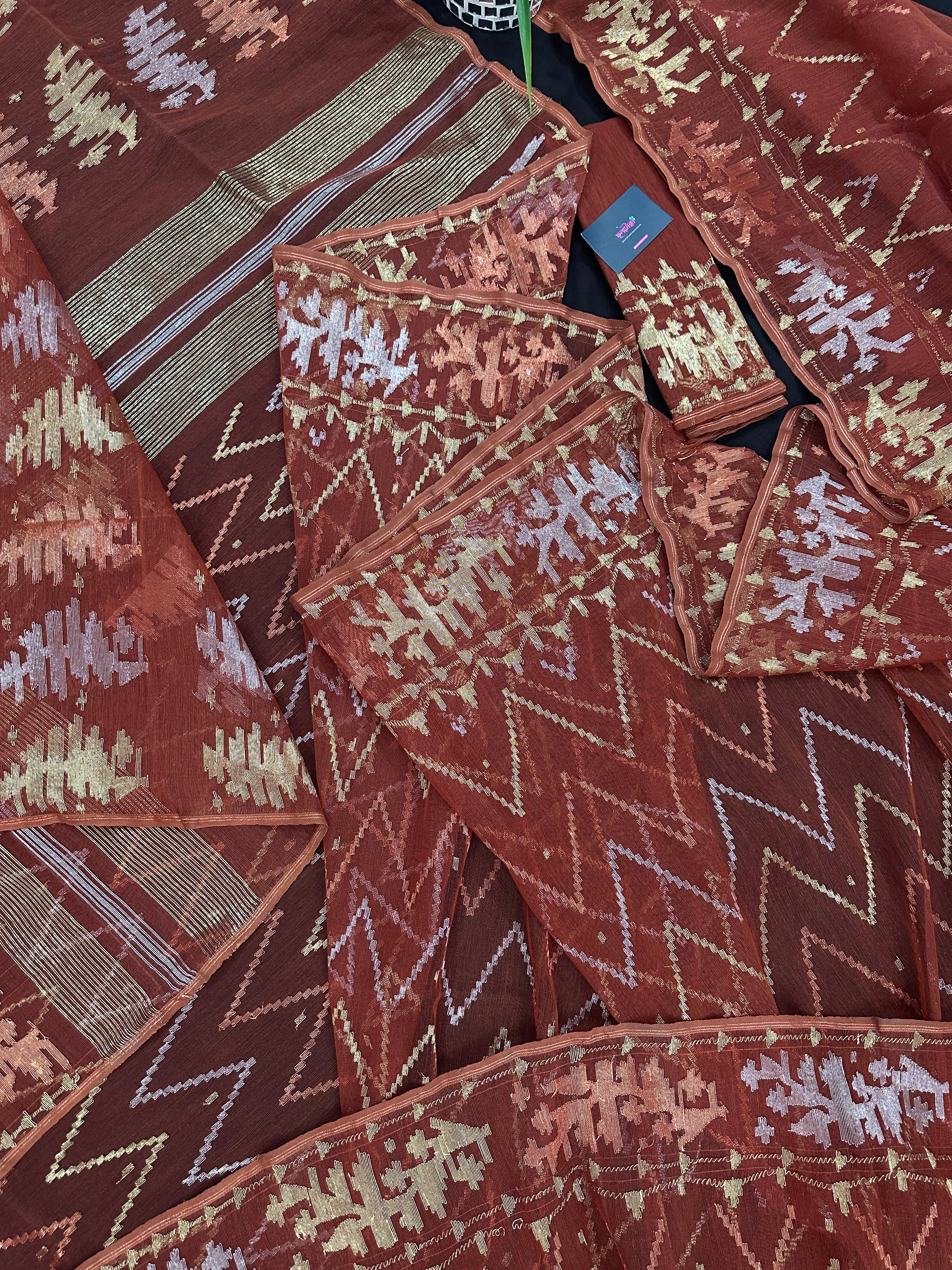 Brown reshom halfsilk jamdani saree with golden silver & copper jori work.