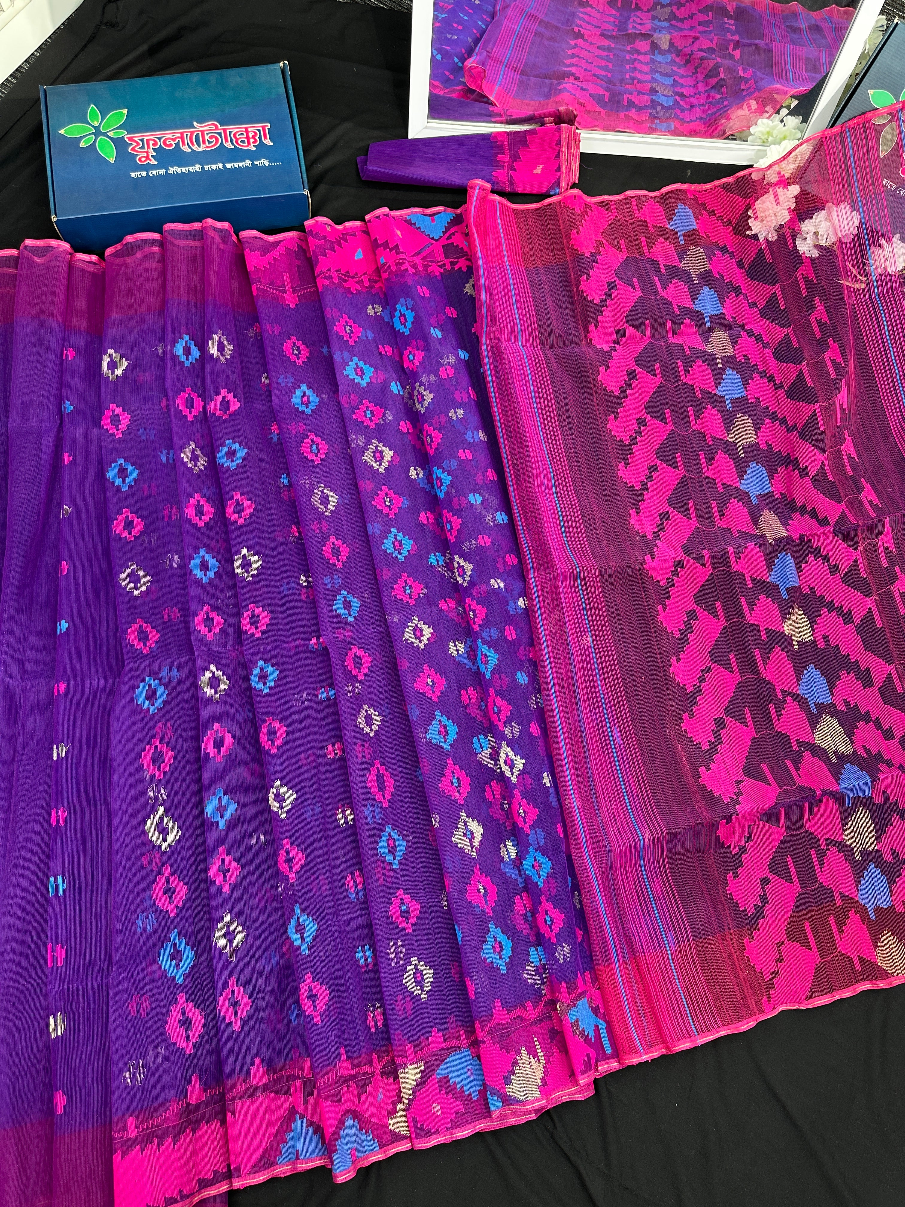 Purple halfsilk jamdani saree with blue pink threads work and golden jori work