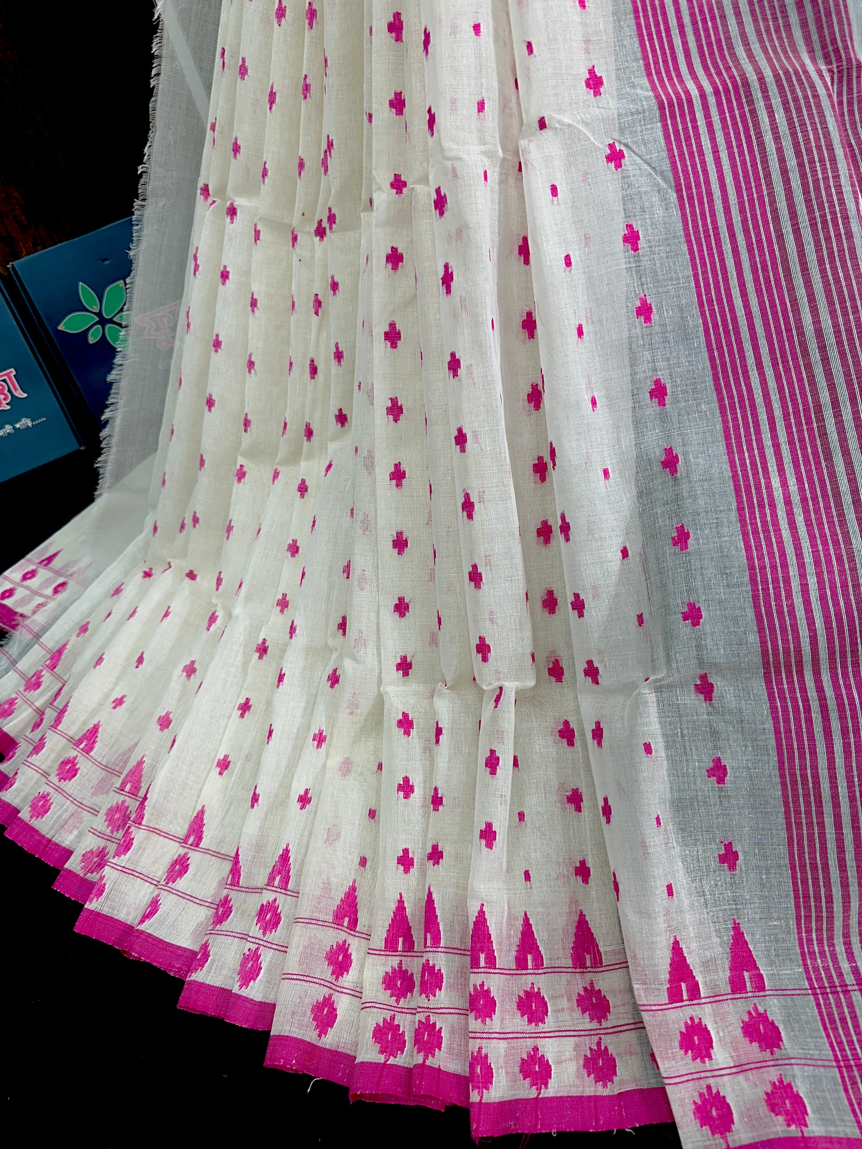 White cotton jamdani saree with pink buta and pink threads work