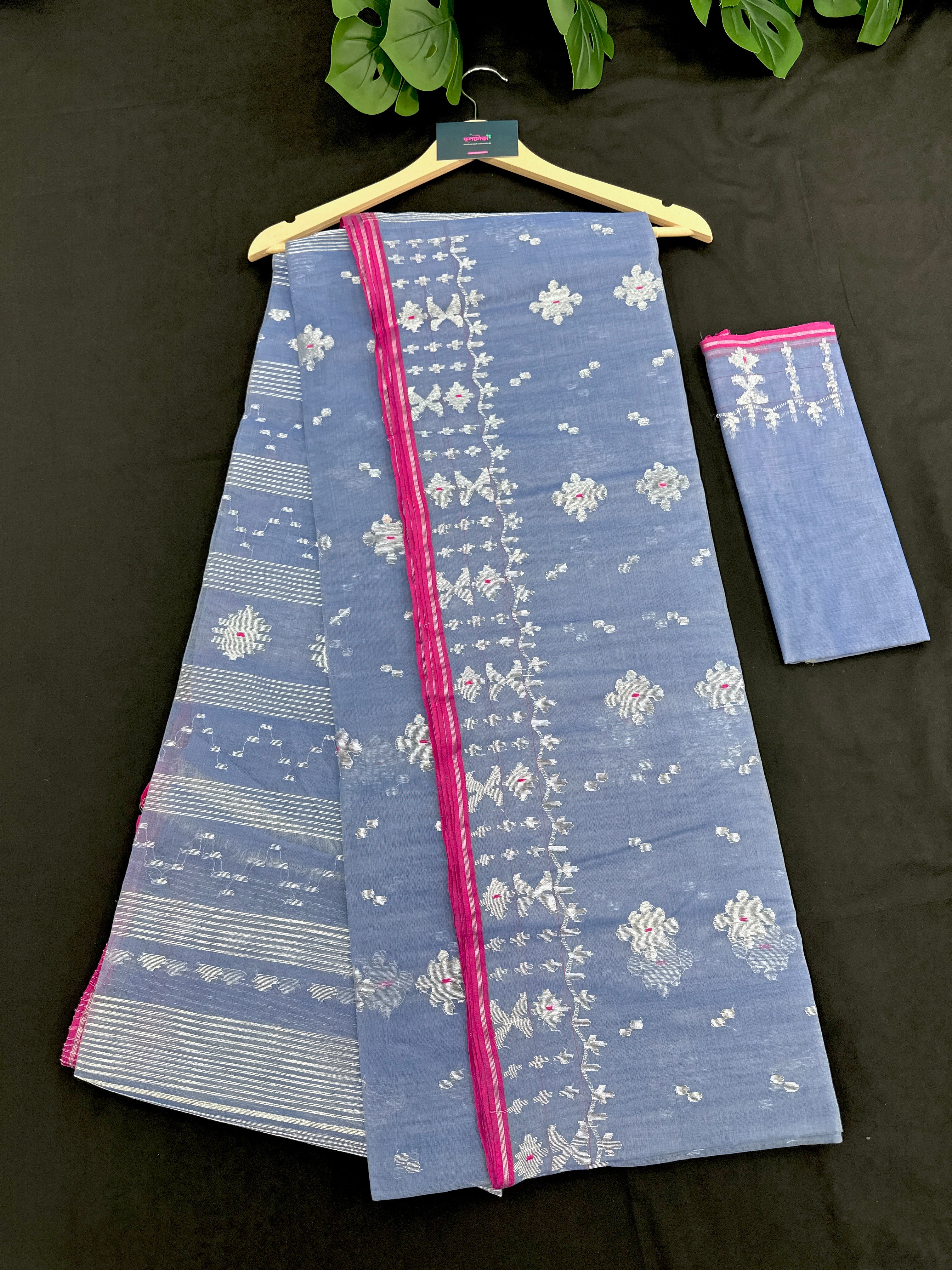 Ash blue Dhakai Jamdani features intricate silver jori work.