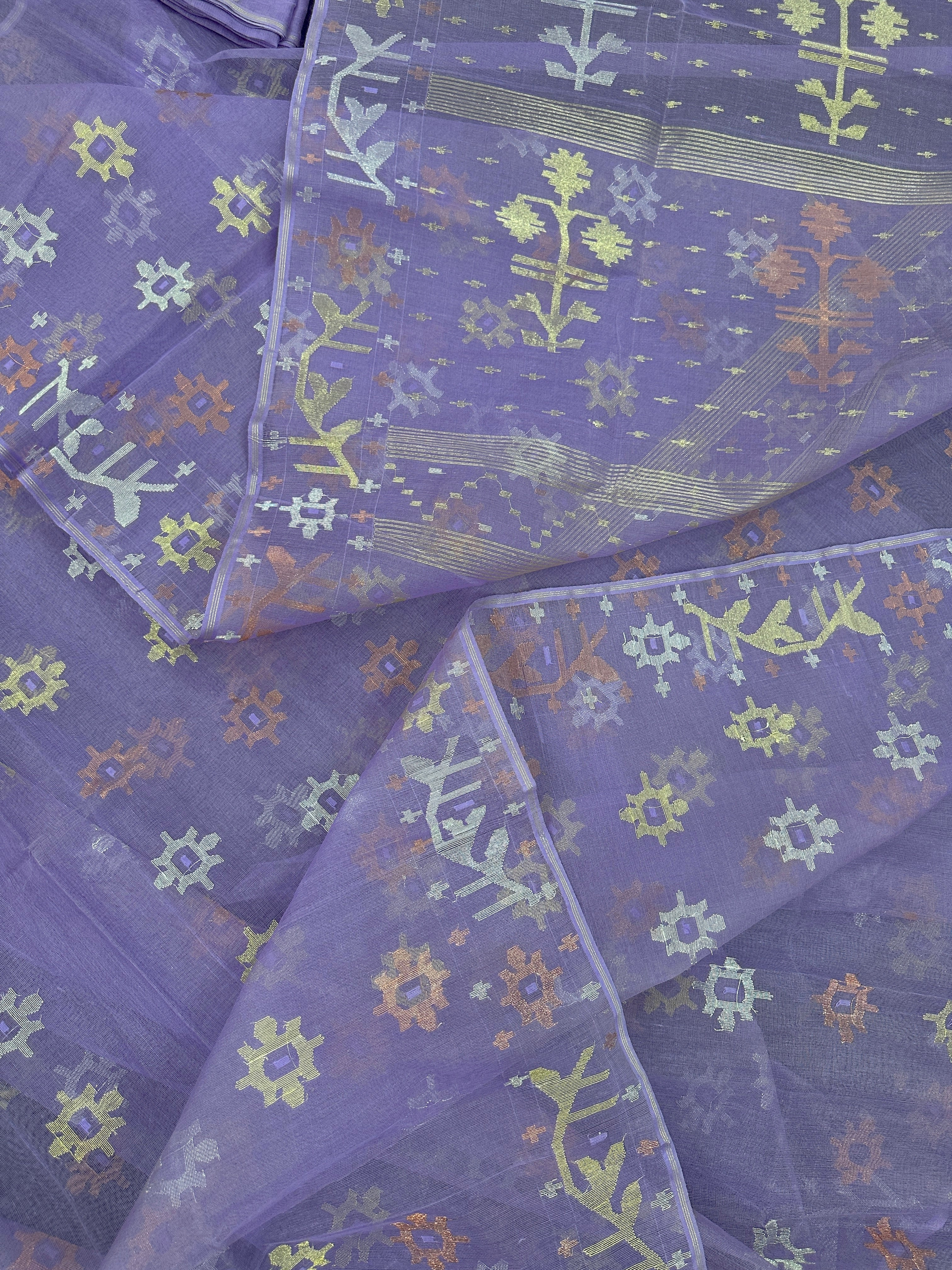 Lite lavender jamdani saree with golden silver copper jori work.