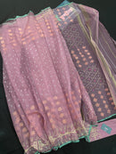 Onion colour jamdani saree with pink meena and green border.