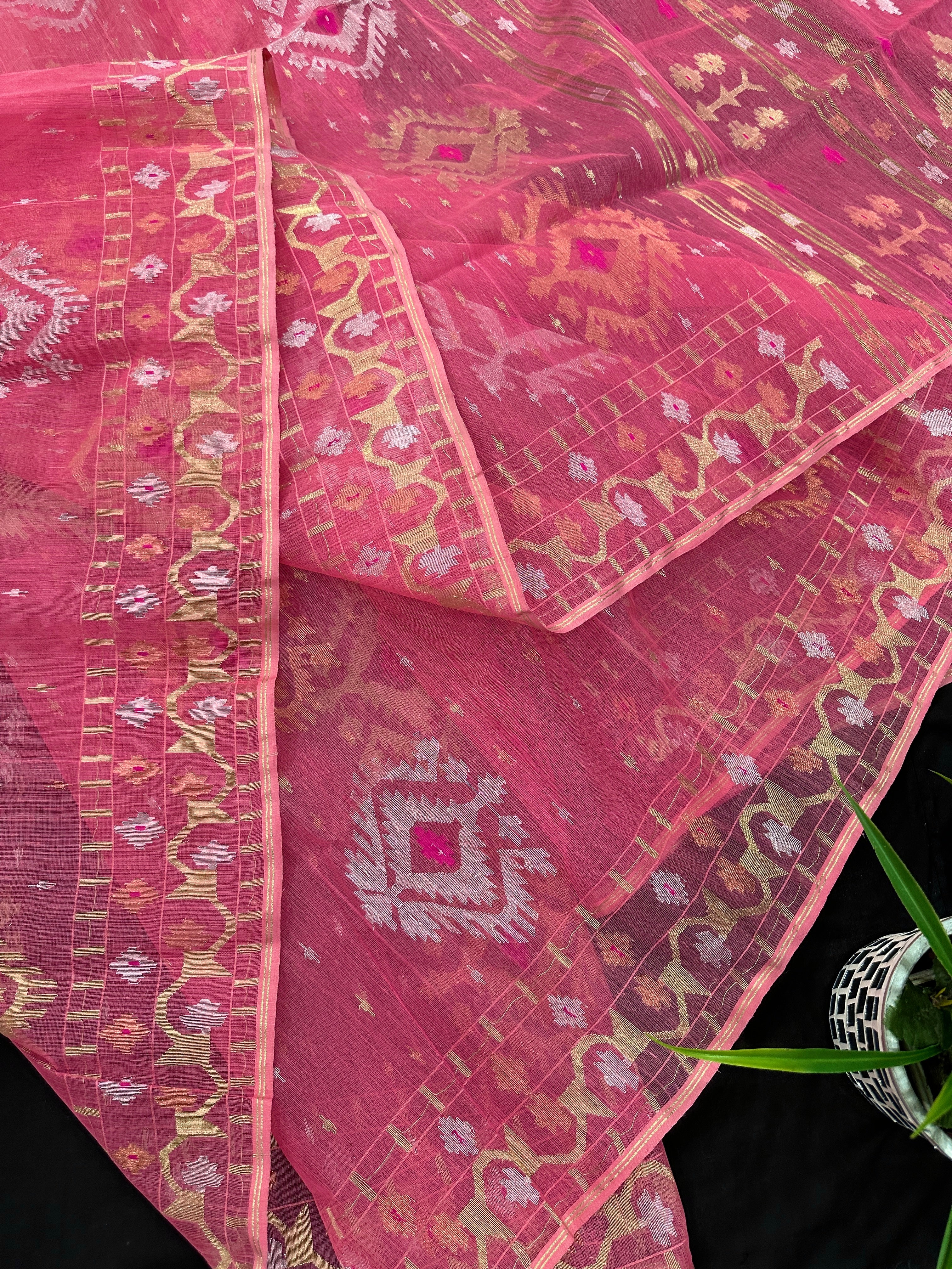 Peach pink jamdani saree with golden silver & copper jori work.