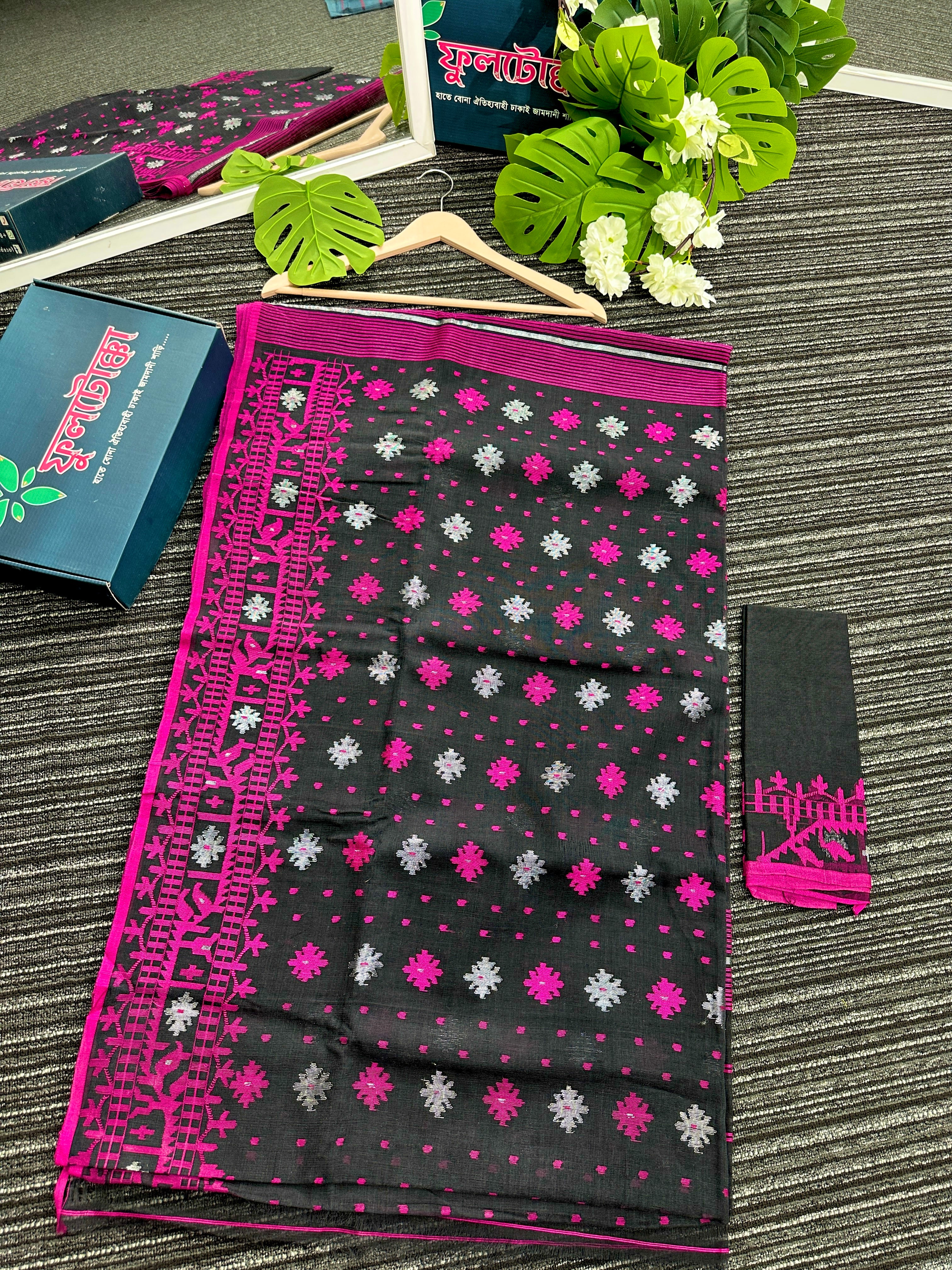 Black cotton jamdani saree with magenta threads work and silver jori work