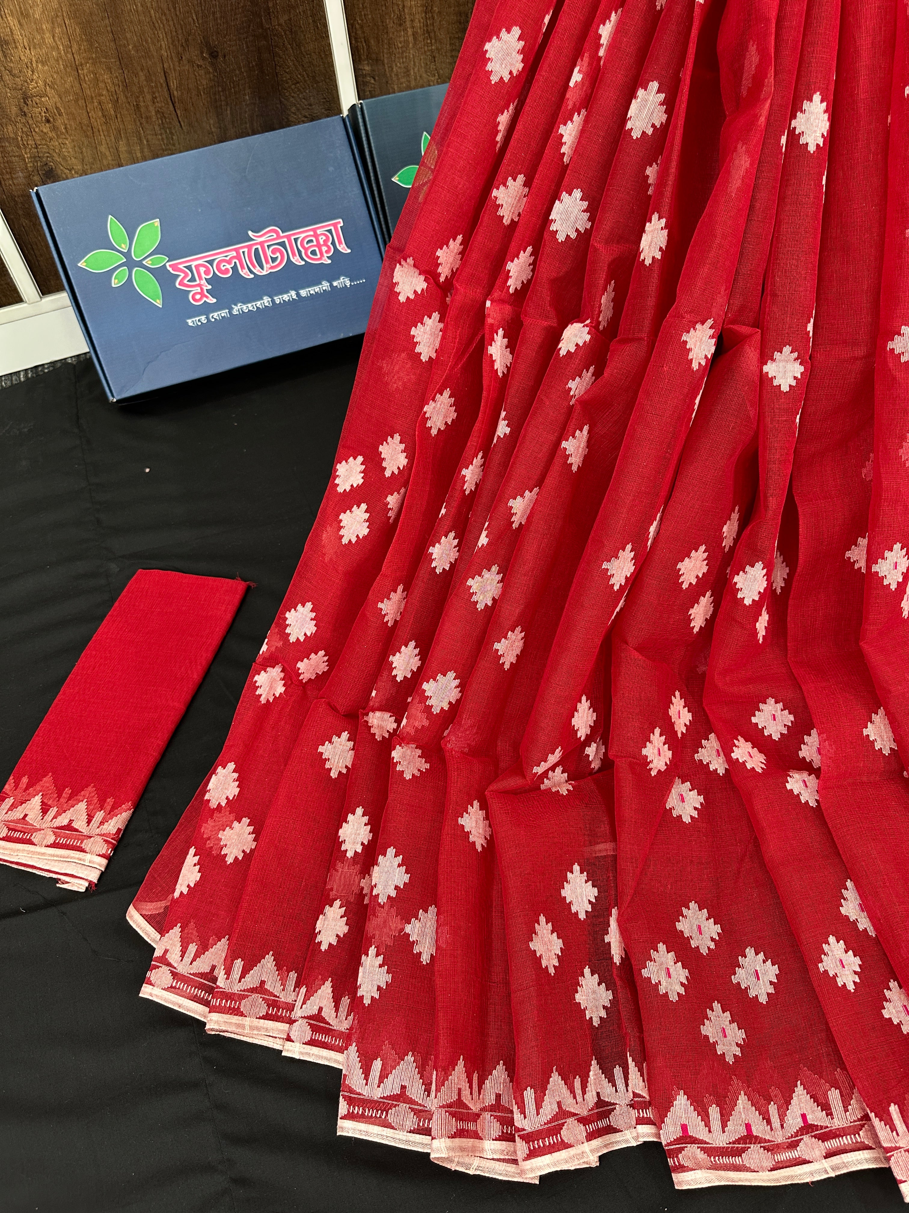 Radish Maroon cotton jamdani saree with white threads work all over work.
