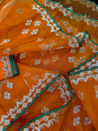 Orange soft jamdani saree with silver jori work & green border.