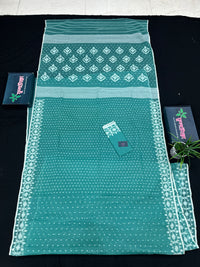 Mint cotton jamdani saree with white threads work all over work and blouse piece.