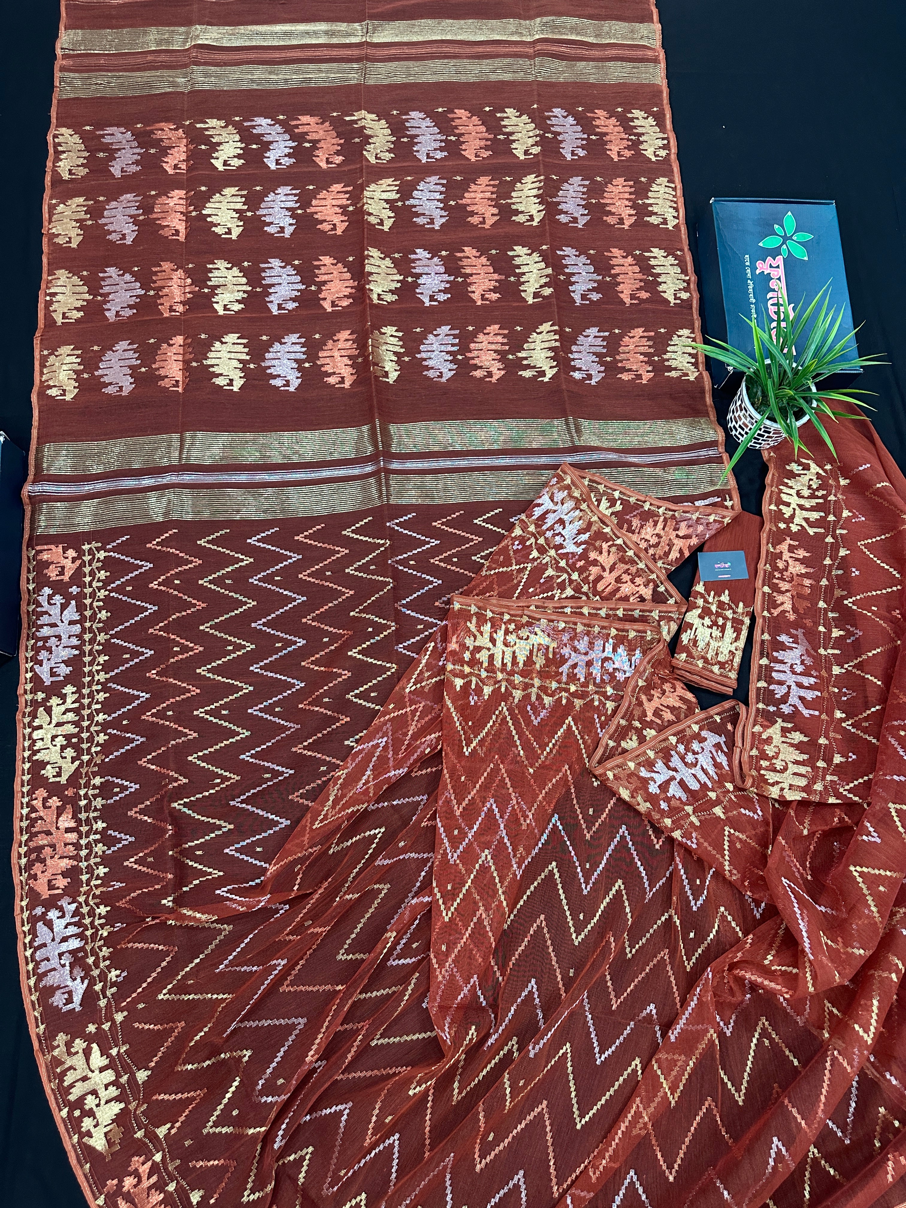 Brown reshom halfsilk jamdani saree with golden silver & copper jori work.