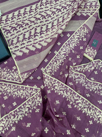 Onion cotton jamdani saree with yellowish threads work all over work.