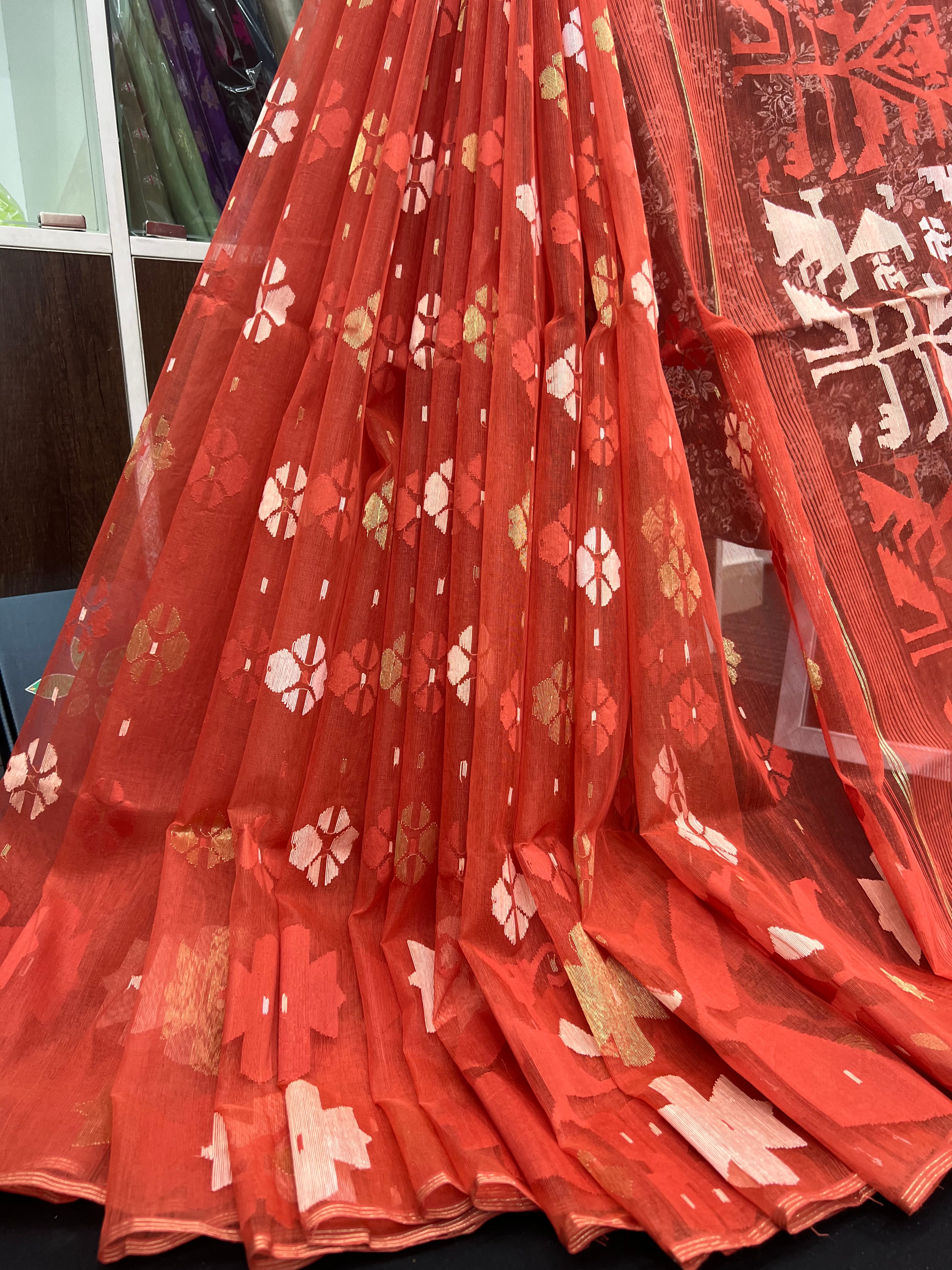 Brick colour halfsilk jamdani saree with self threads work and off white threads work