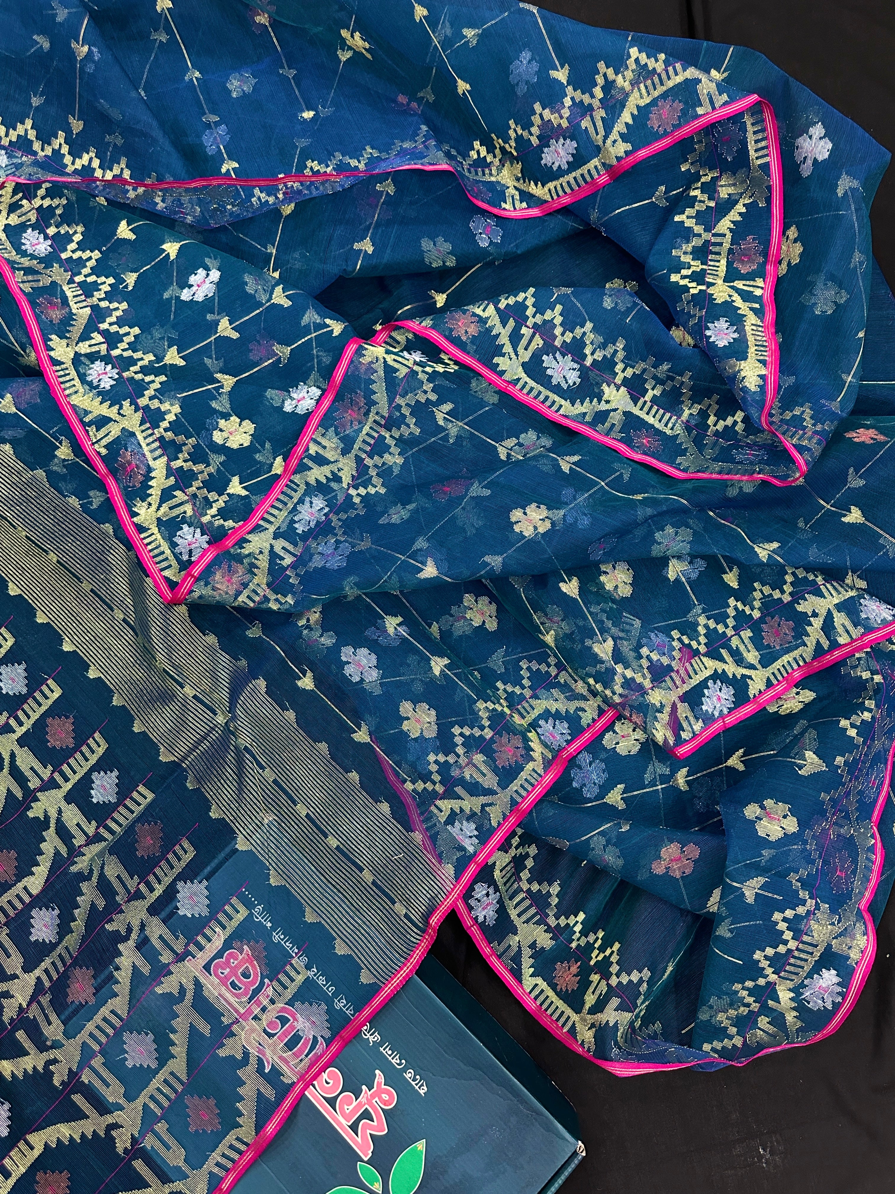 Peacock blue jamdani saree with golden silver copper jori work and pink border