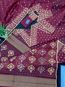 Maroon cotton jamdani with yellowish threads work.