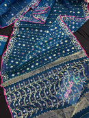 Peacock blue jamdani saree with golden silver copper jori work and pink border