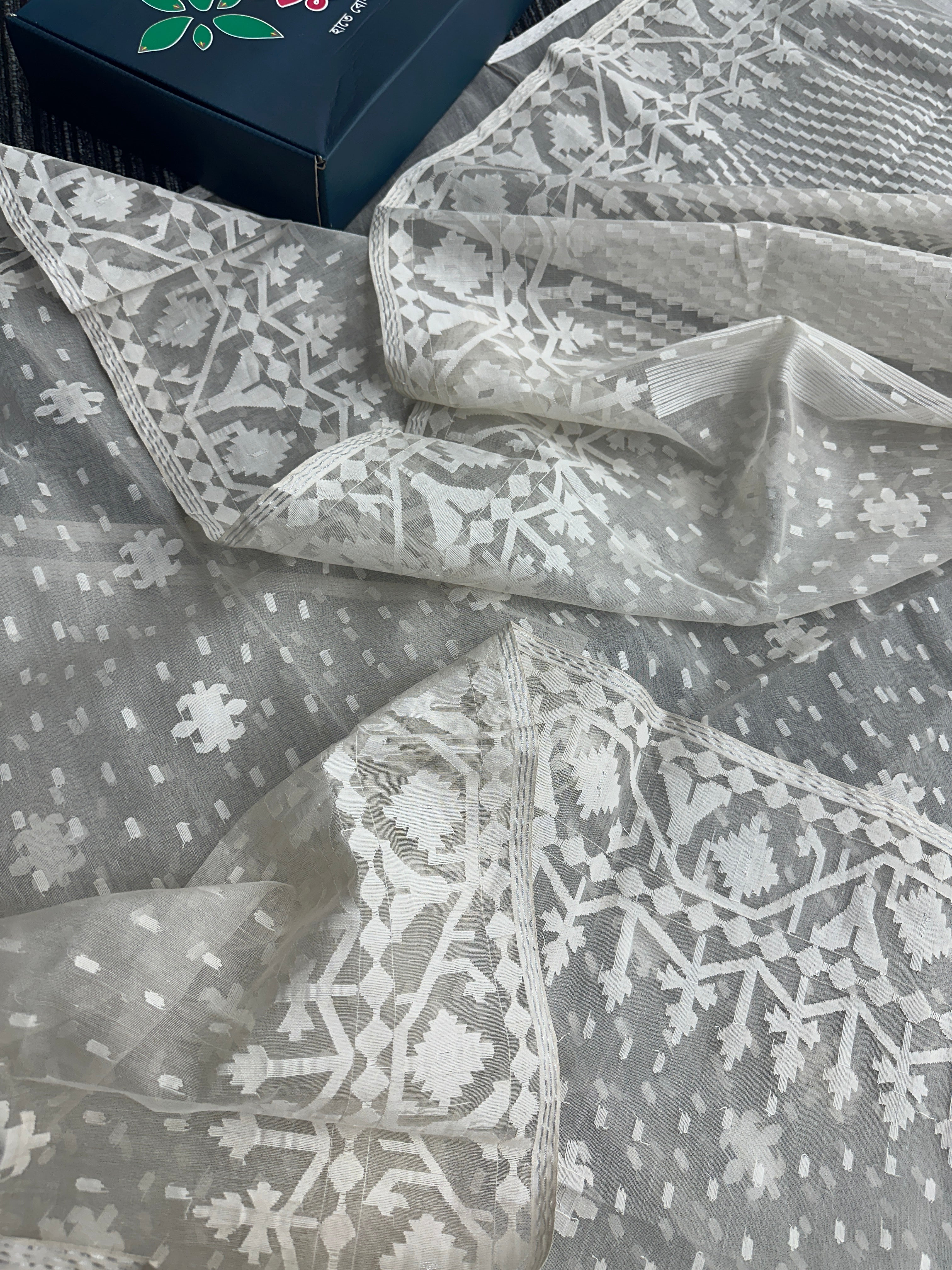 White exclusive halfsilk jamdani saree with white threads work and blouse piece