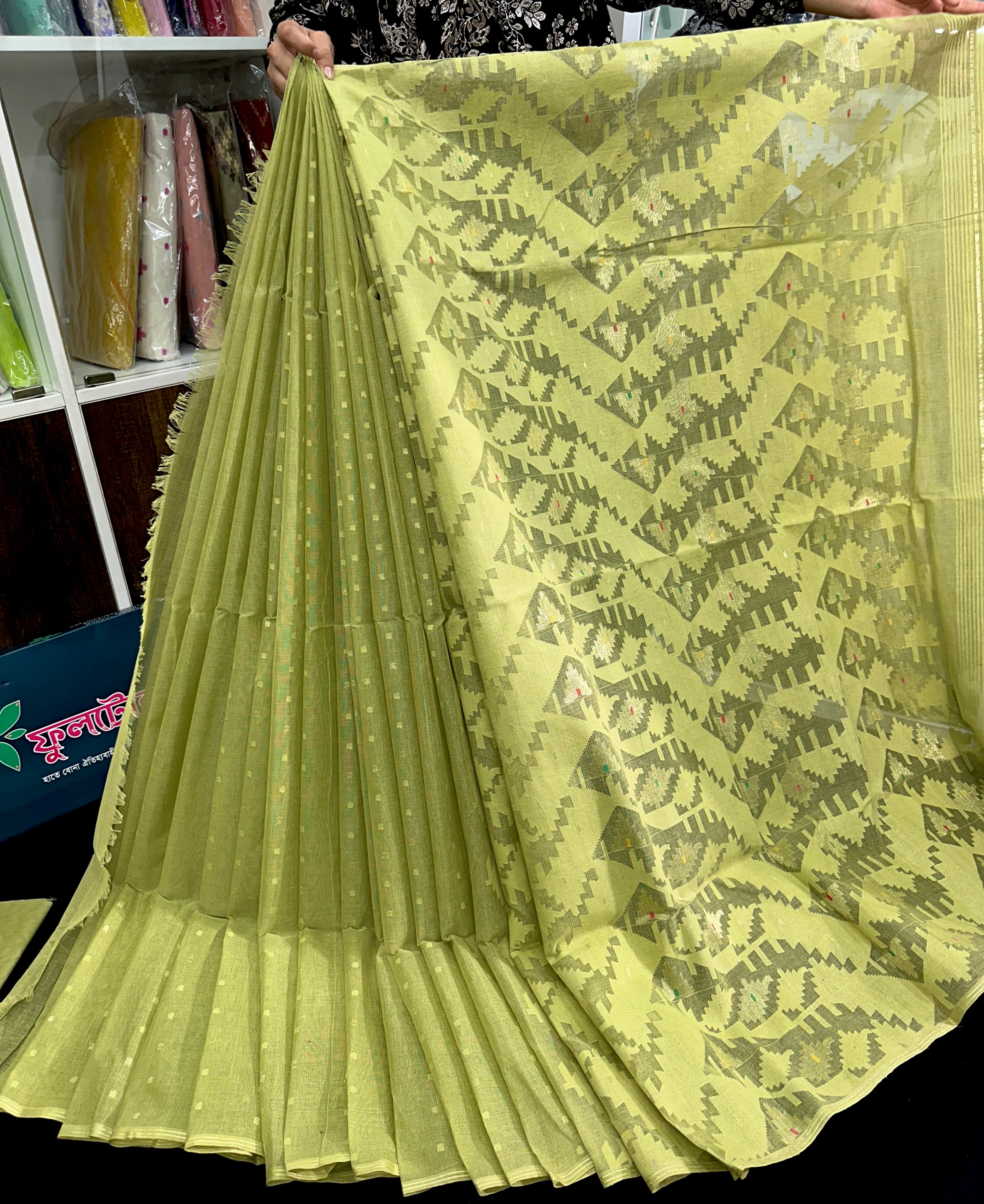 Olive jamdani saree with white threads work and self threads work