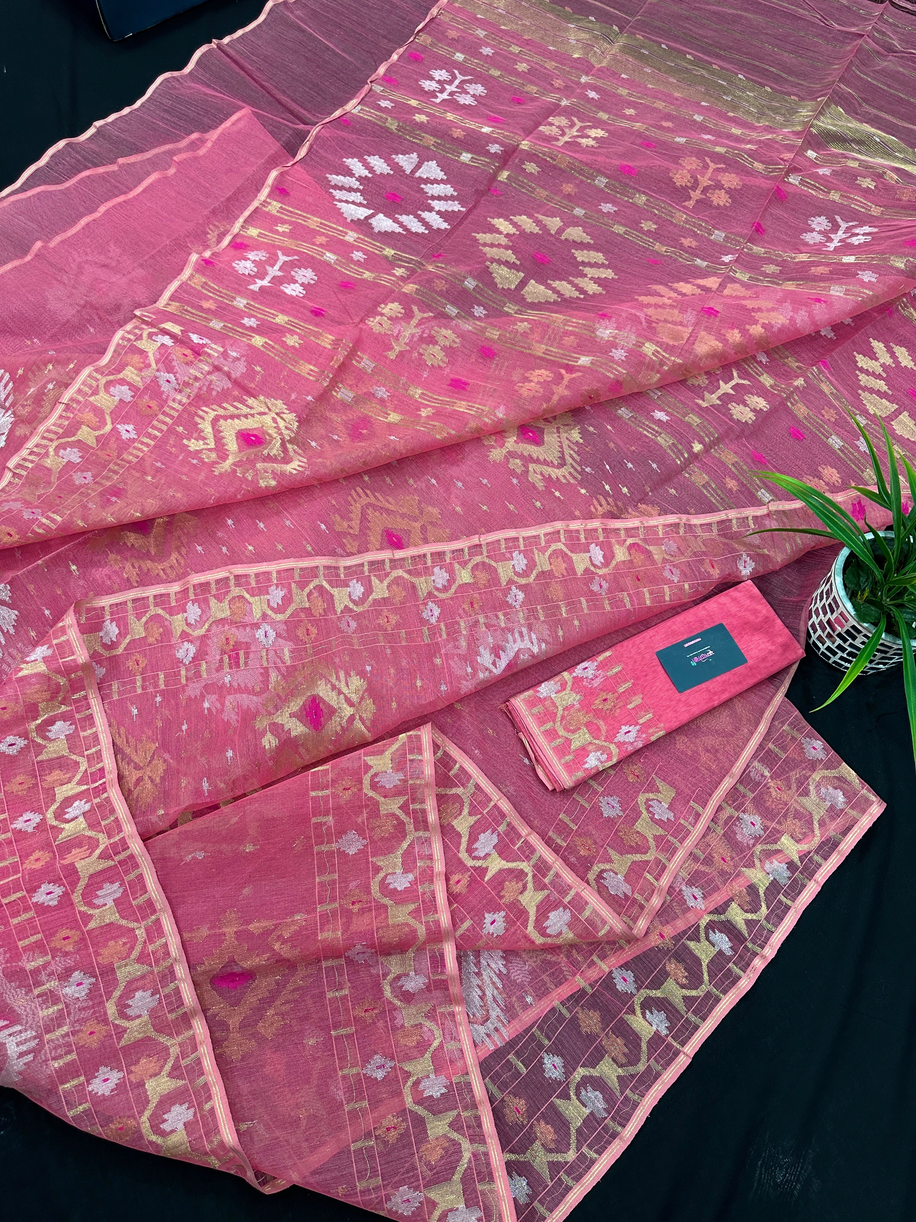 Peach pink jamdani saree with golden silver & copper jori work.