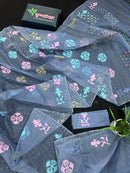Powdery blue jamdani saree with pink blue and golden jori work.