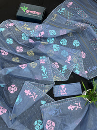 Powdery blue jamdani saree with pink blue and golden jori work.