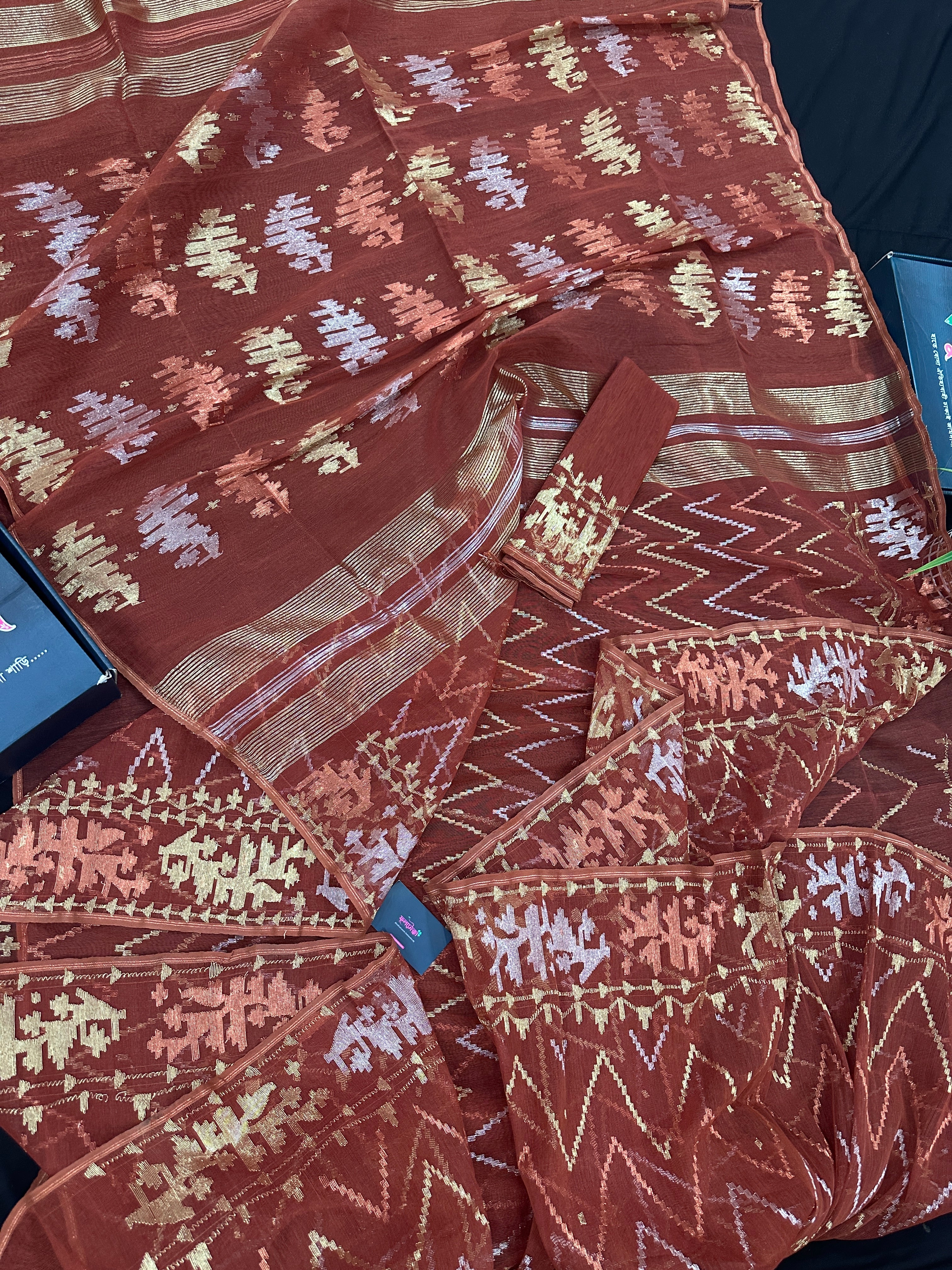 Brown reshom halfsilk jamdani saree with golden silver & copper jori work.