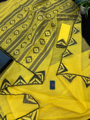 Yellow cotton jamdani sari with simple paar.