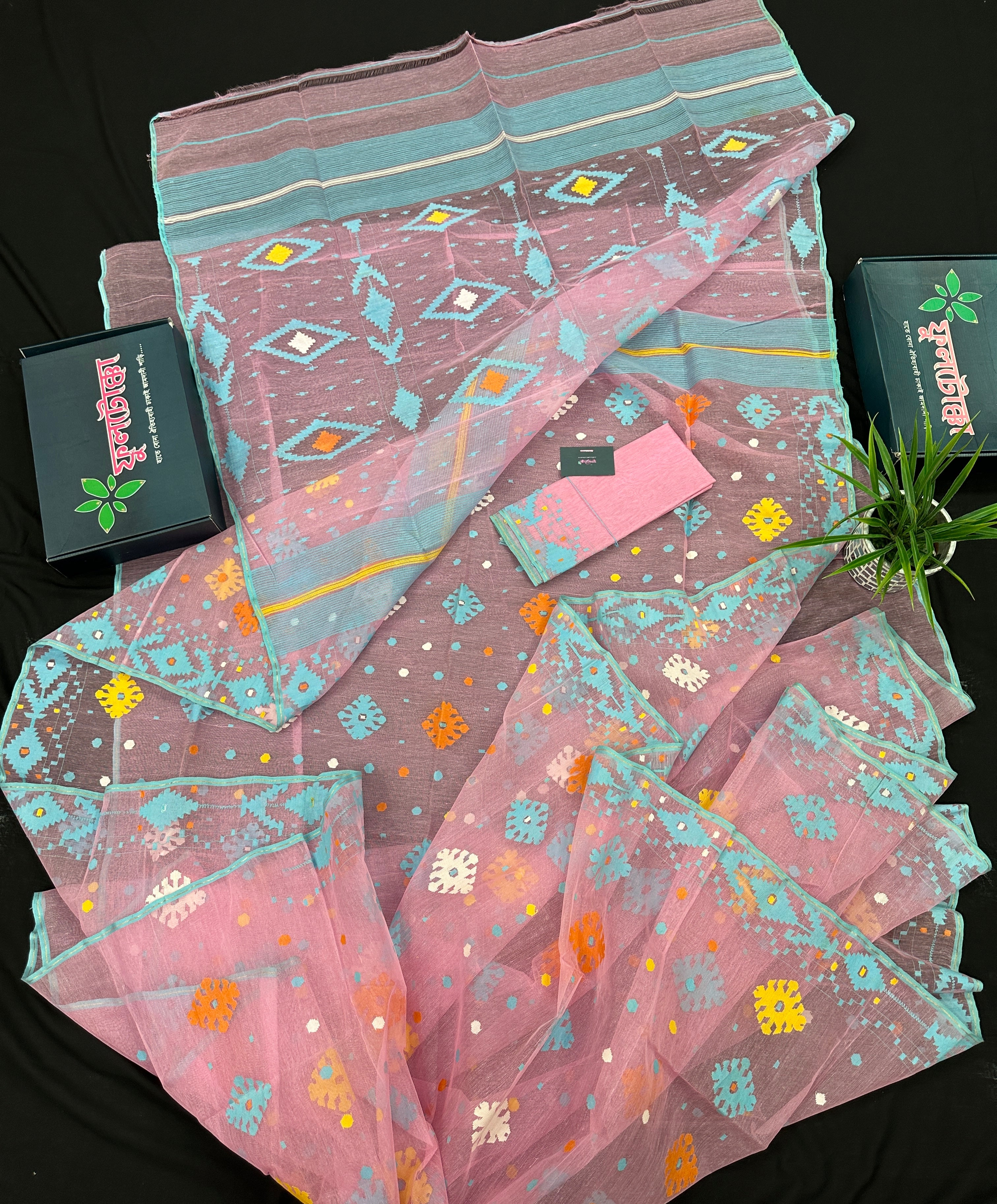 Pink jamdani saree with blue white yellow orange threads work and blouse piece.