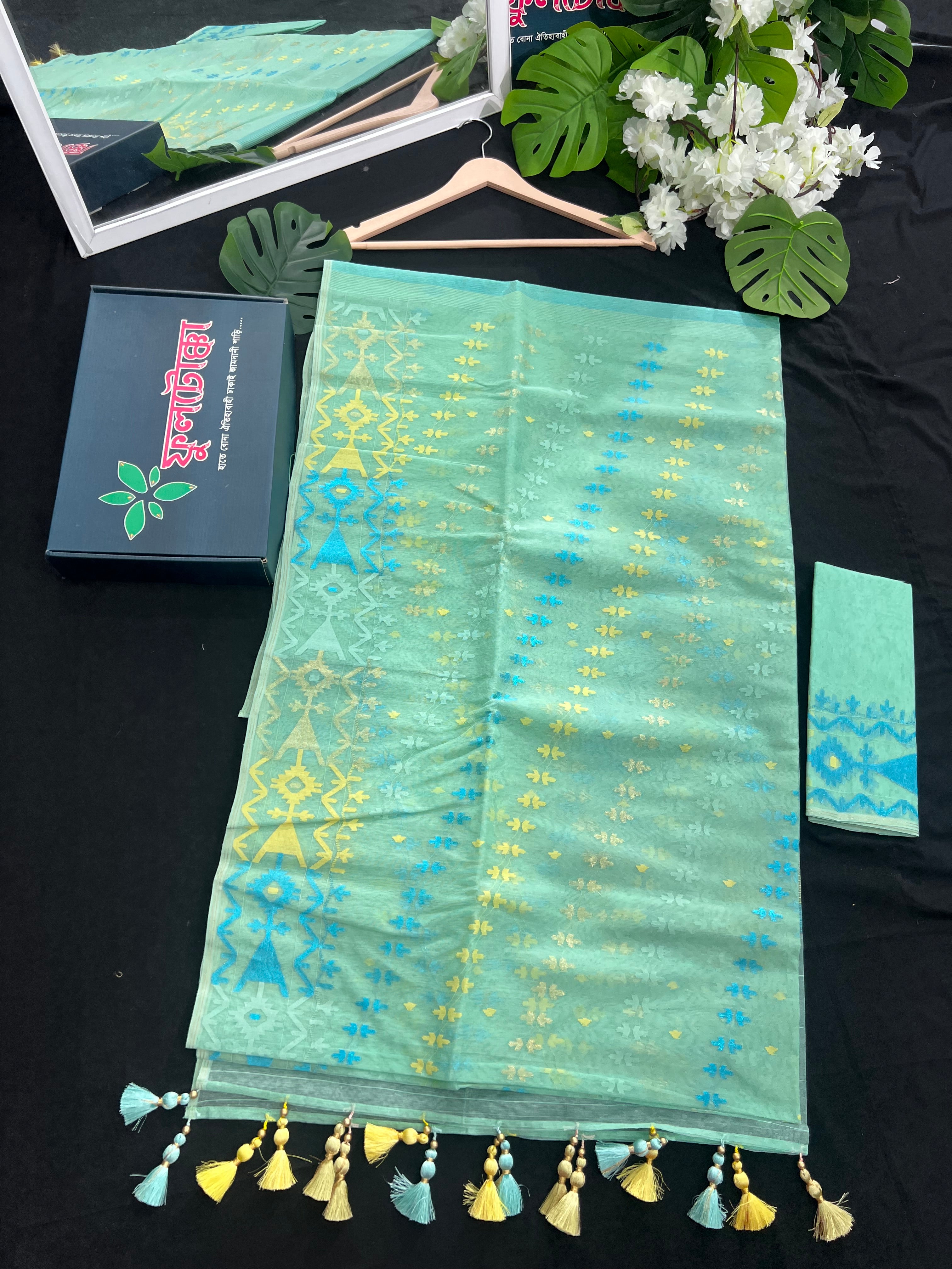 Pastel blue halfsilk jamdani saree with sky jori work and yellow threads work