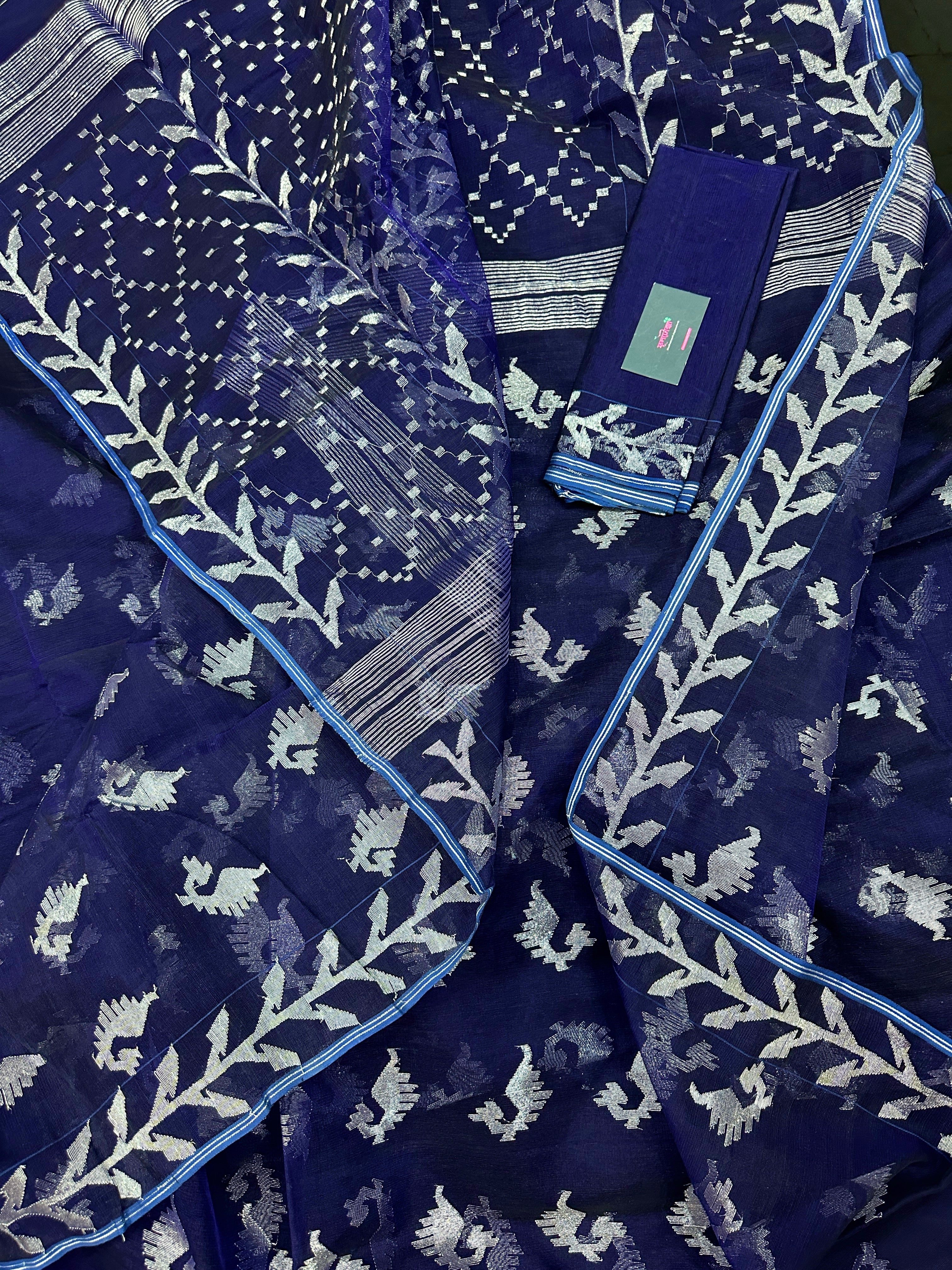 Navy blue jamdani saree with silver jori work soft threads all over work.