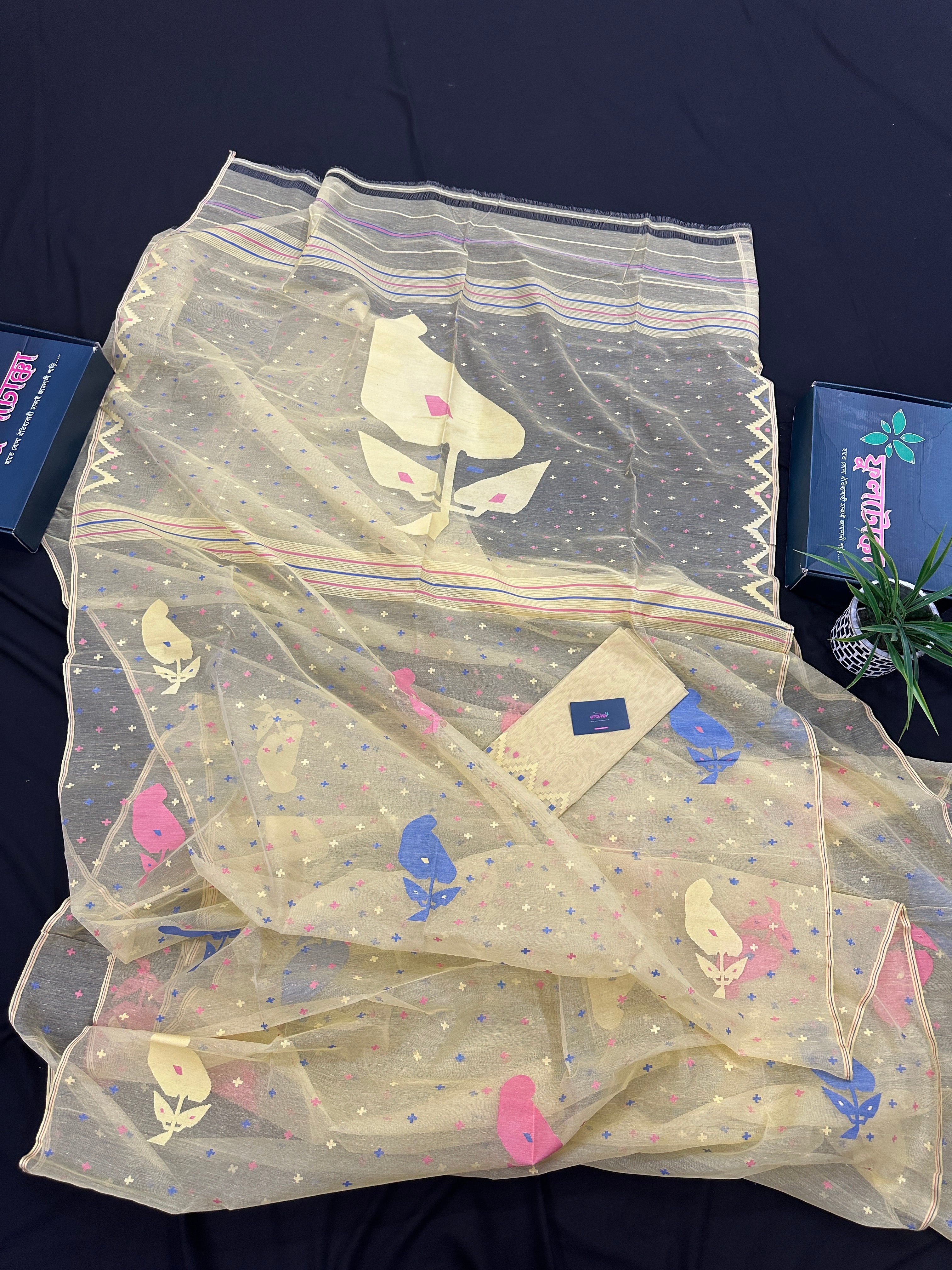 Baby yellow halfsilk jamdani saree with blue pink baby yellow threads work.