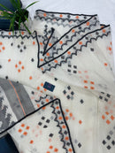 White cotton jamdani saree with orange & black threads work.
