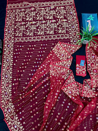 Reddish Maroon Bridal Exclusive dhakai jamdani saree with all over golden jori work soft count.