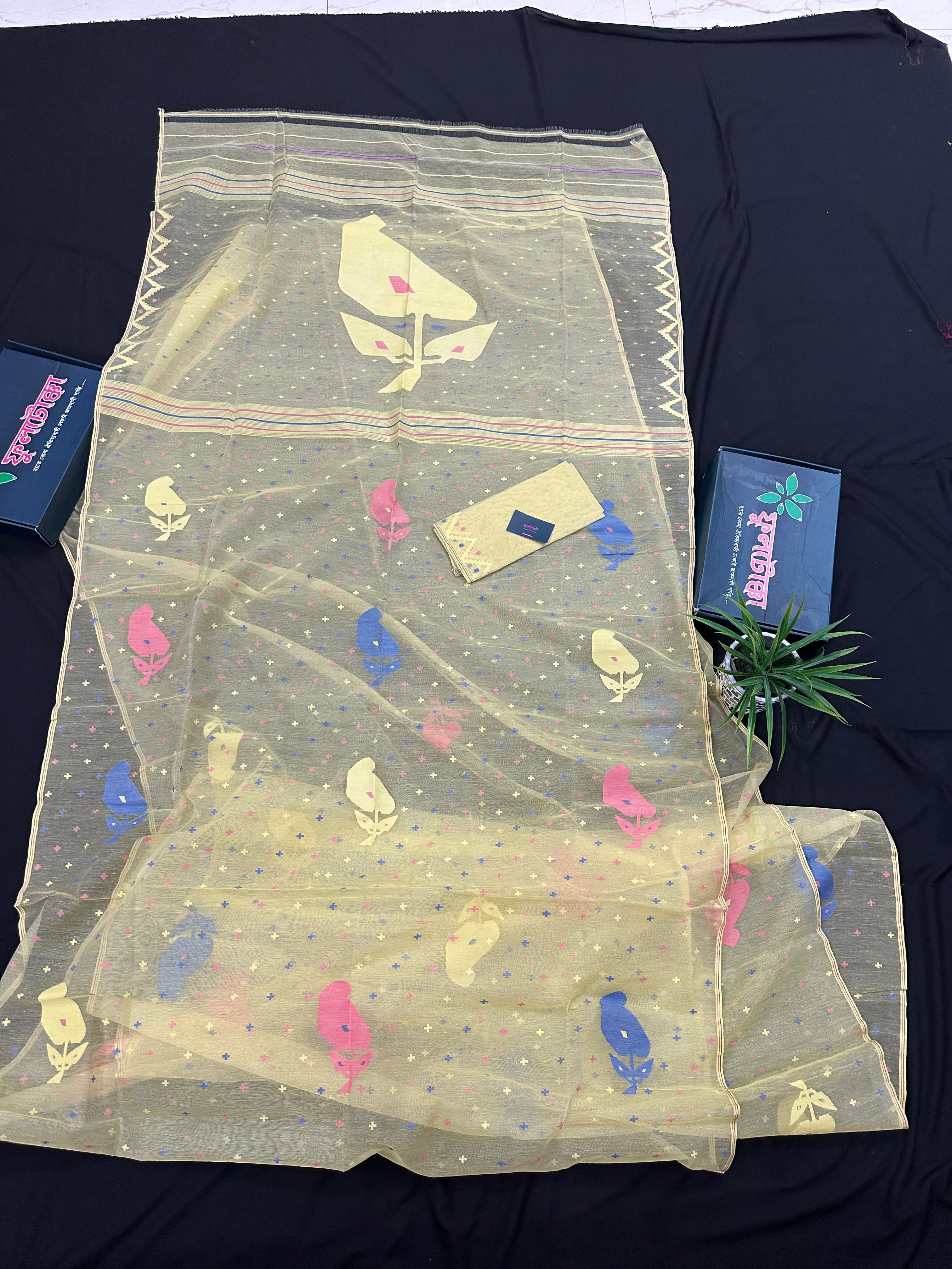 Baby yellow halfsilk jamdani saree with blue pink baby yellow threads work.