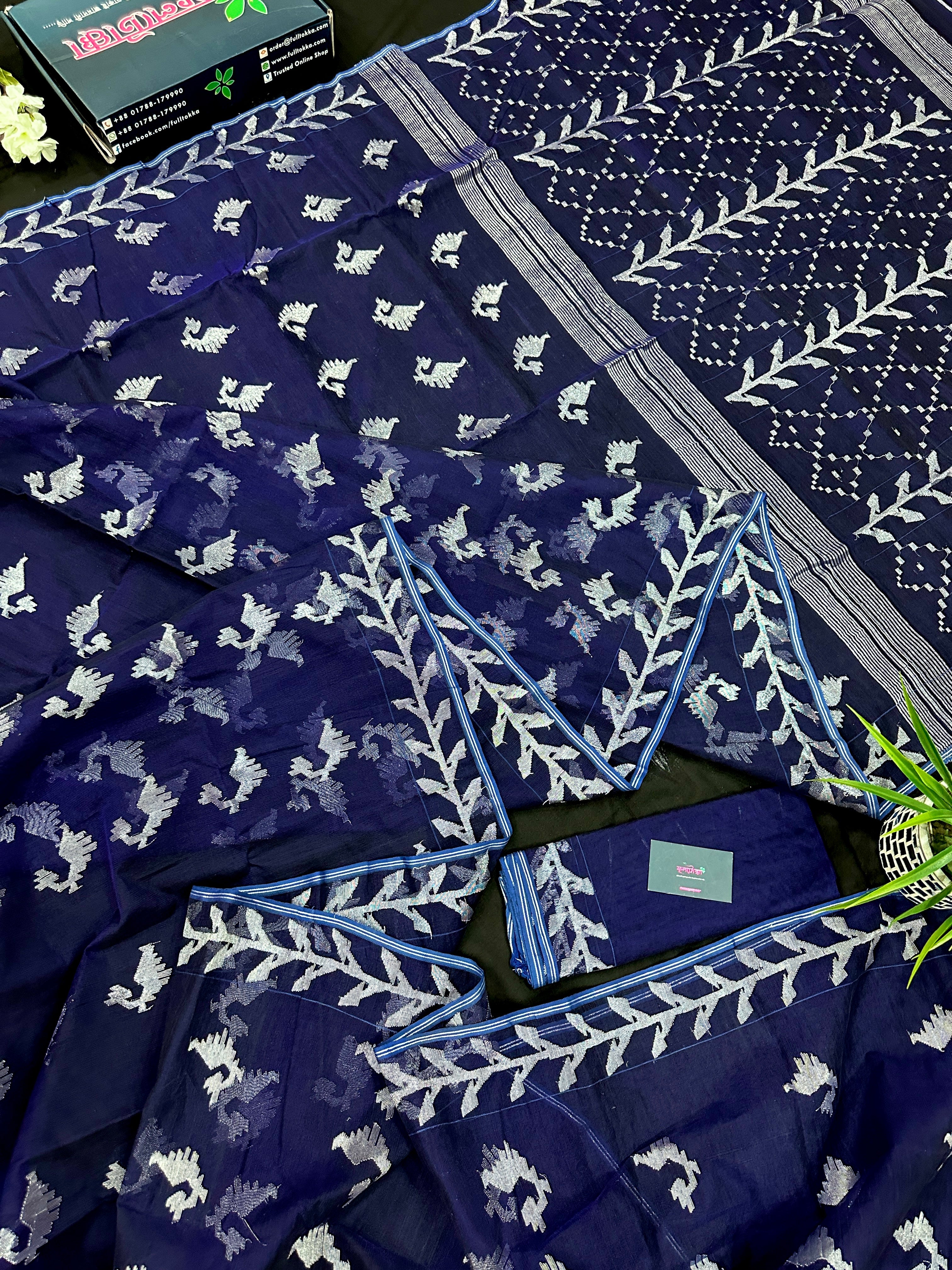 Navy blue jamdani saree with silver jori work soft threads all over work.