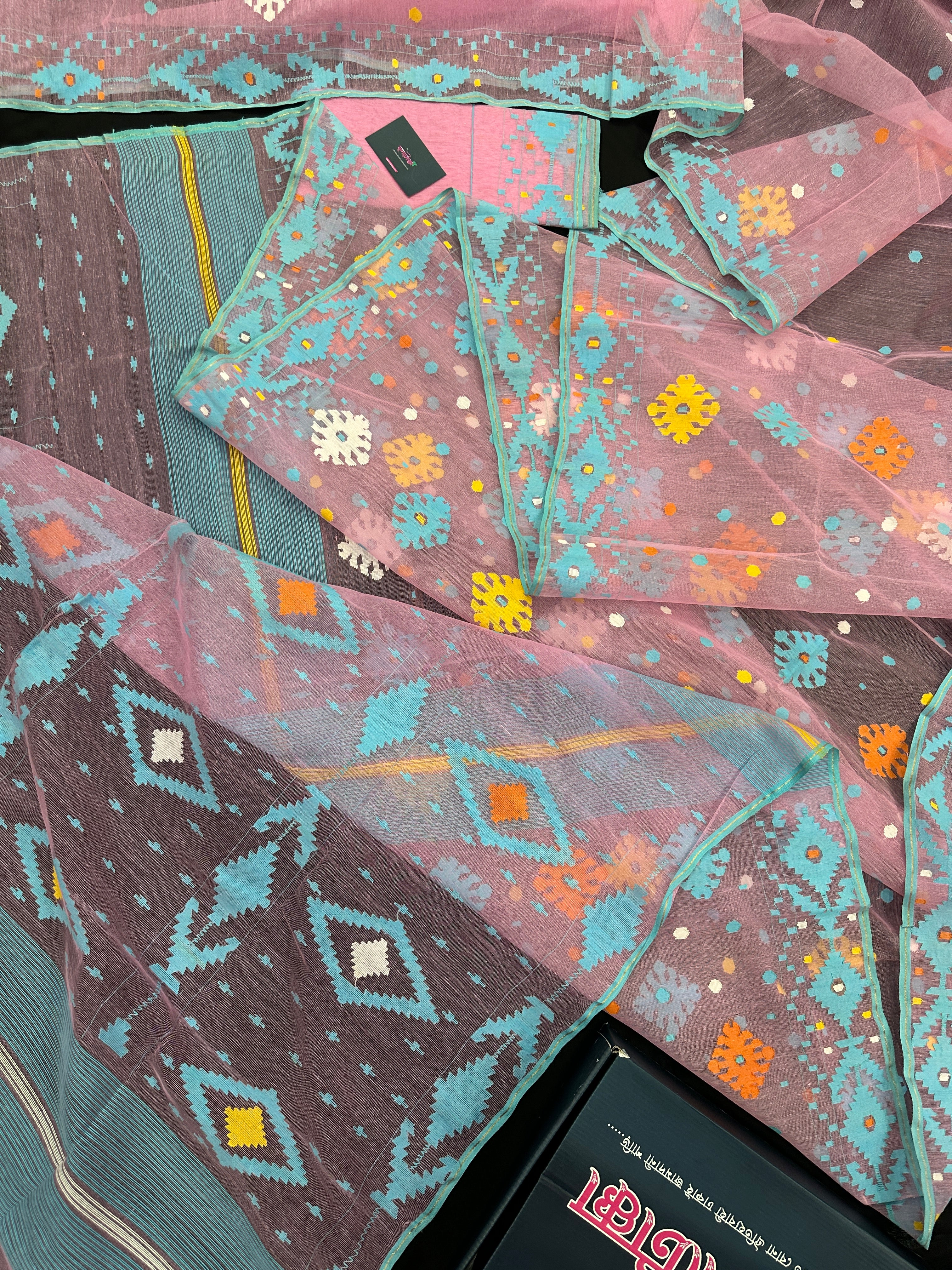 Pink jamdani saree with blue white yellow orange threads work and blouse piece.