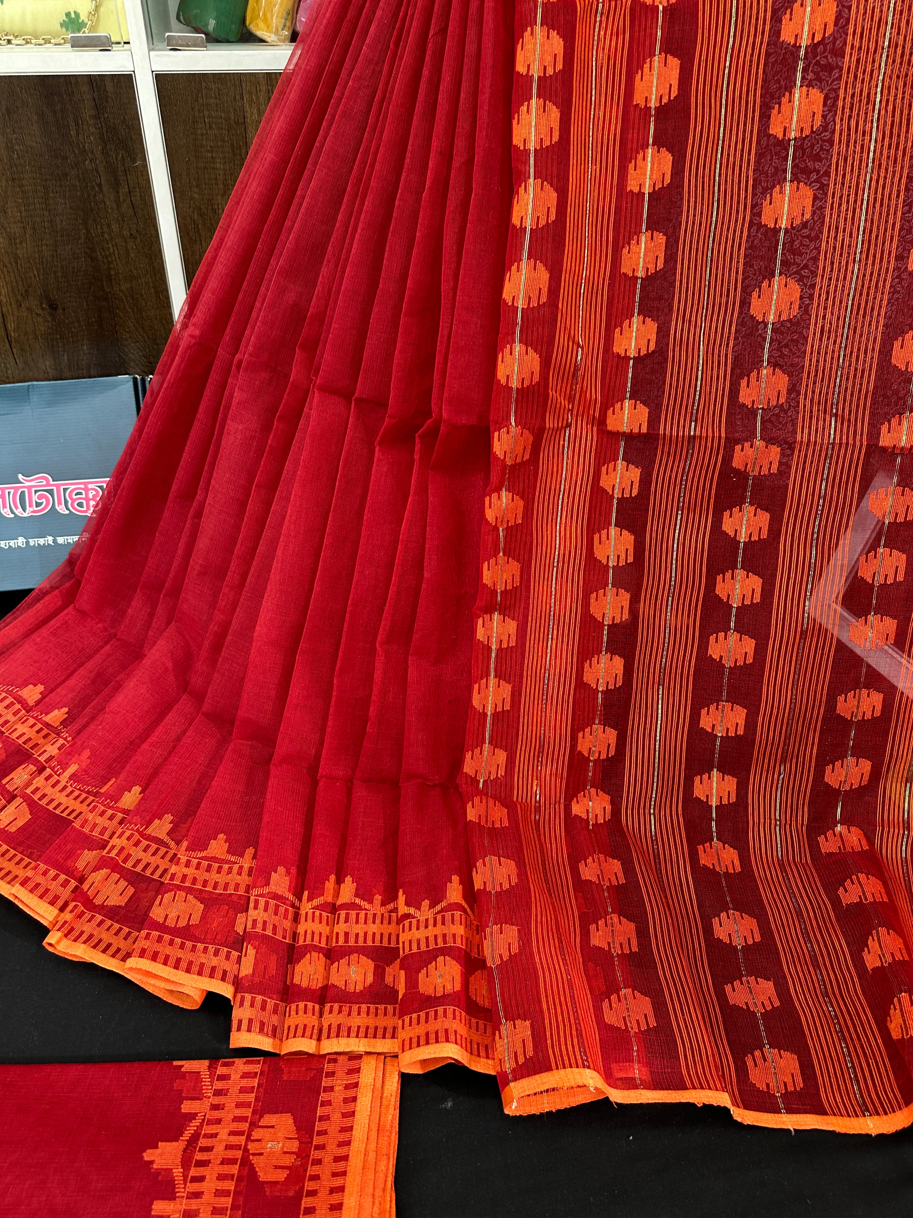 Red cotton jamdani saree with orange threads work