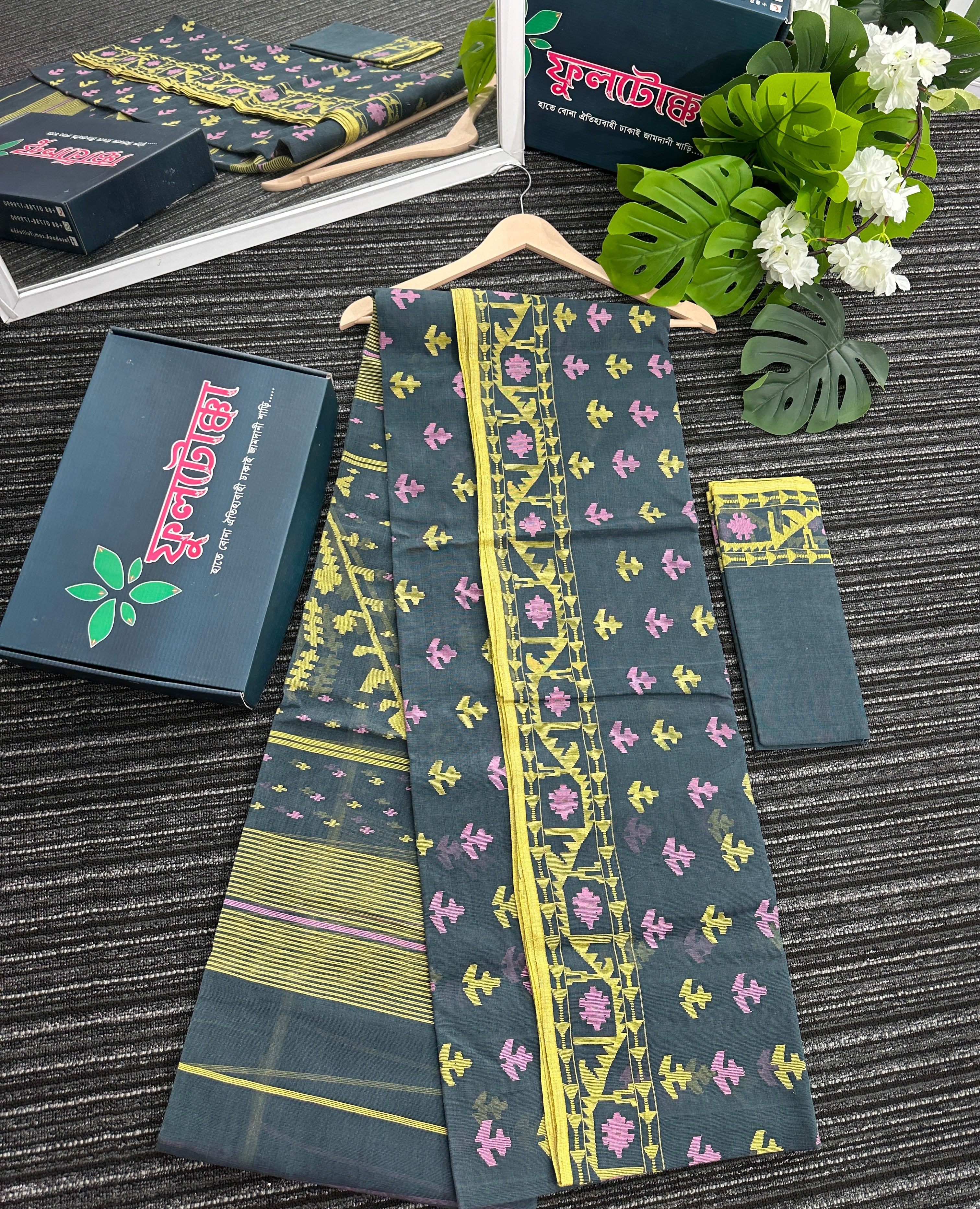 Grey colour jamdani saree with pink yellow threads work