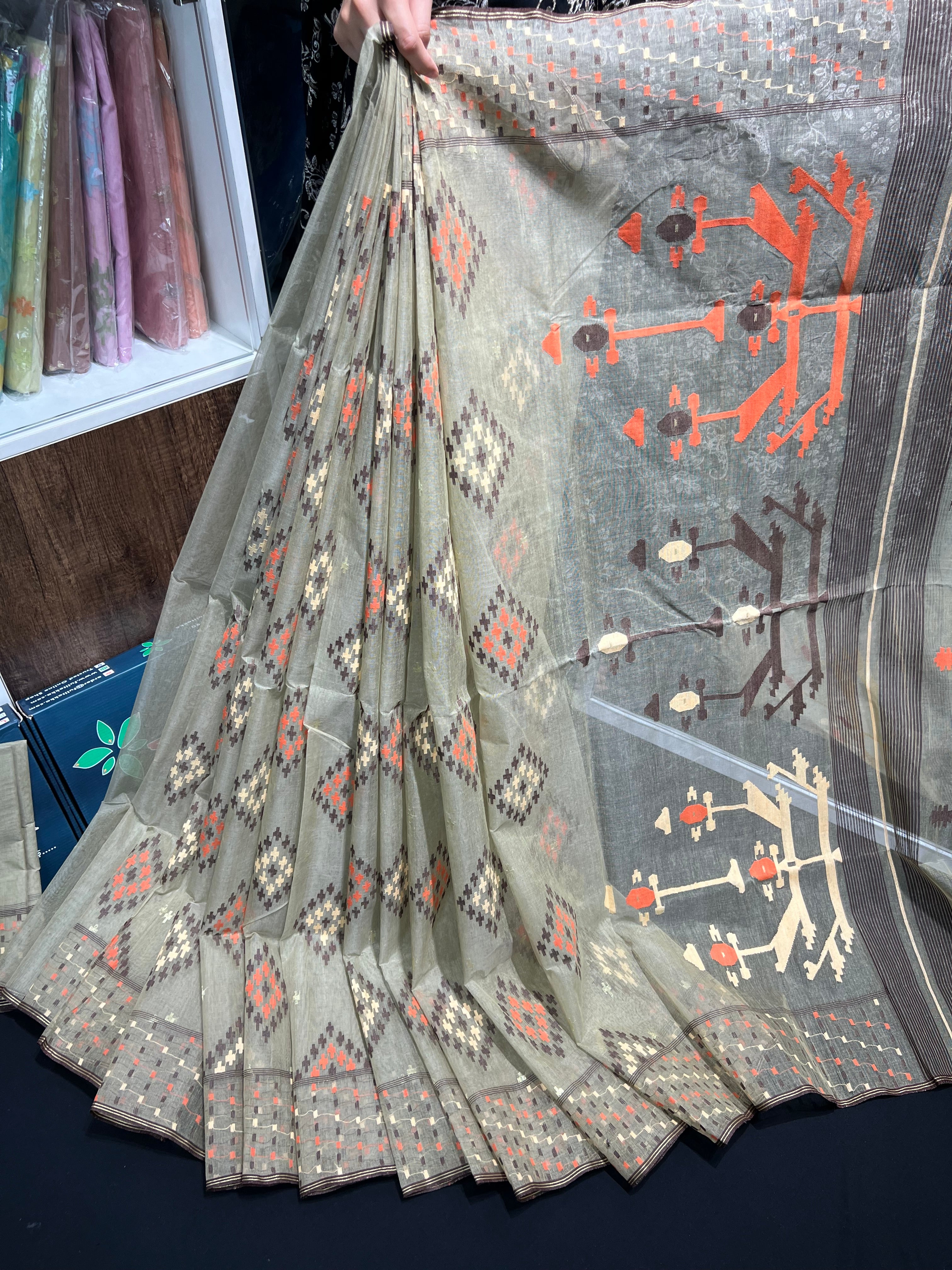 Dark olive halfsilk jamdani saree with orange off white coffe threads work