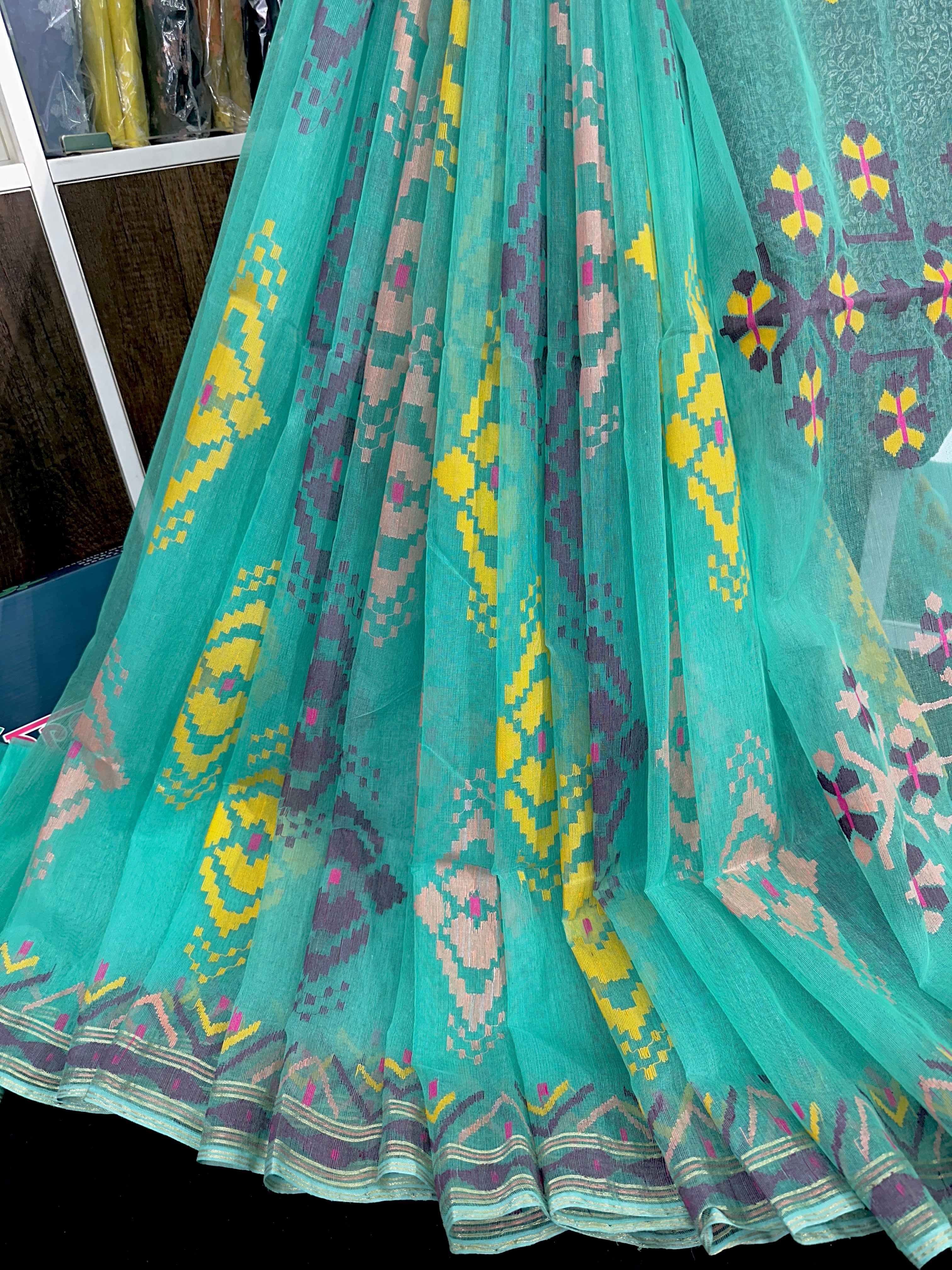 Turquoise blue exclusive halfsilk jamdani saree with yellow pink purple golden threads work