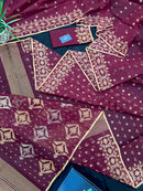 Maroon cotton jamdani with yellowish threads work.