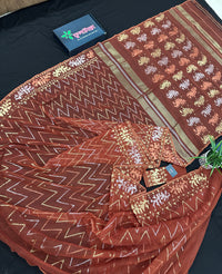 Brown reshom halfsilk jamdani saree with golden silver & copper jori work.