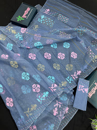 Powdery blue jamdani saree with pink blue and golden jori work.