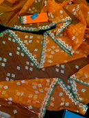 Orange soft jamdani saree with silver jori work & green border.