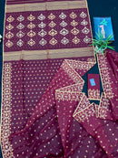 Maroon cotton jamdani with yellowish threads work.