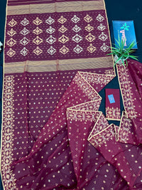 Maroon cotton jamdani with yellowish threads work.